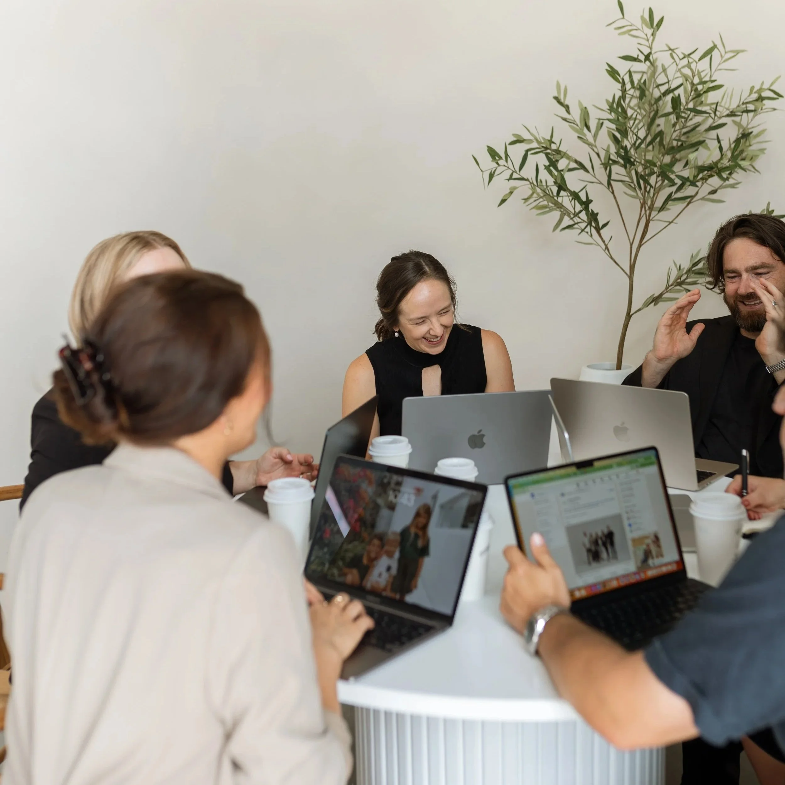 A group of tax accountants meeting to discuss tax planning for business owners in Australia