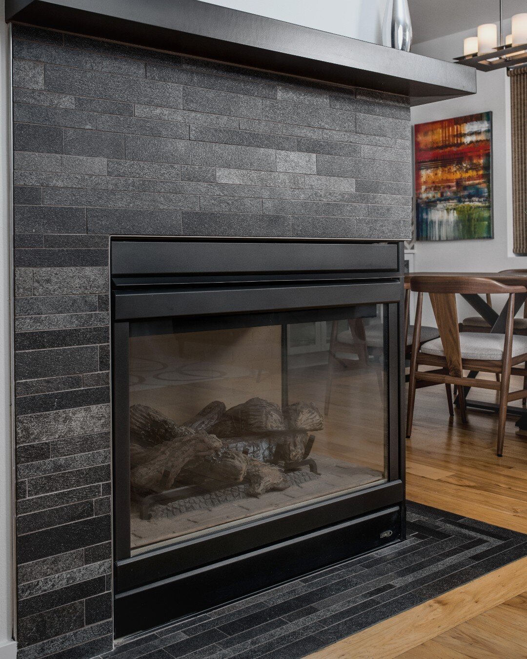 Today would be the perfect day to fire up this custom fireplace from one of our Seattle remodels ❄️