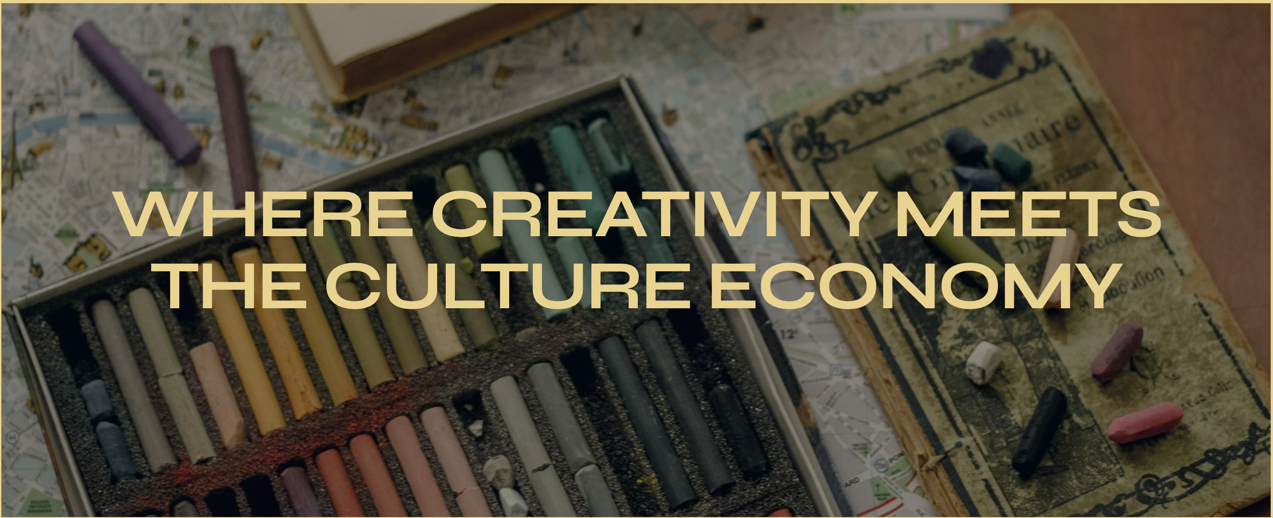Creative art supplies including pastel chalks, crayons, and a vintage book on an old map background with the text 'Where Creativity Meets the Culture Economy' overlaid.