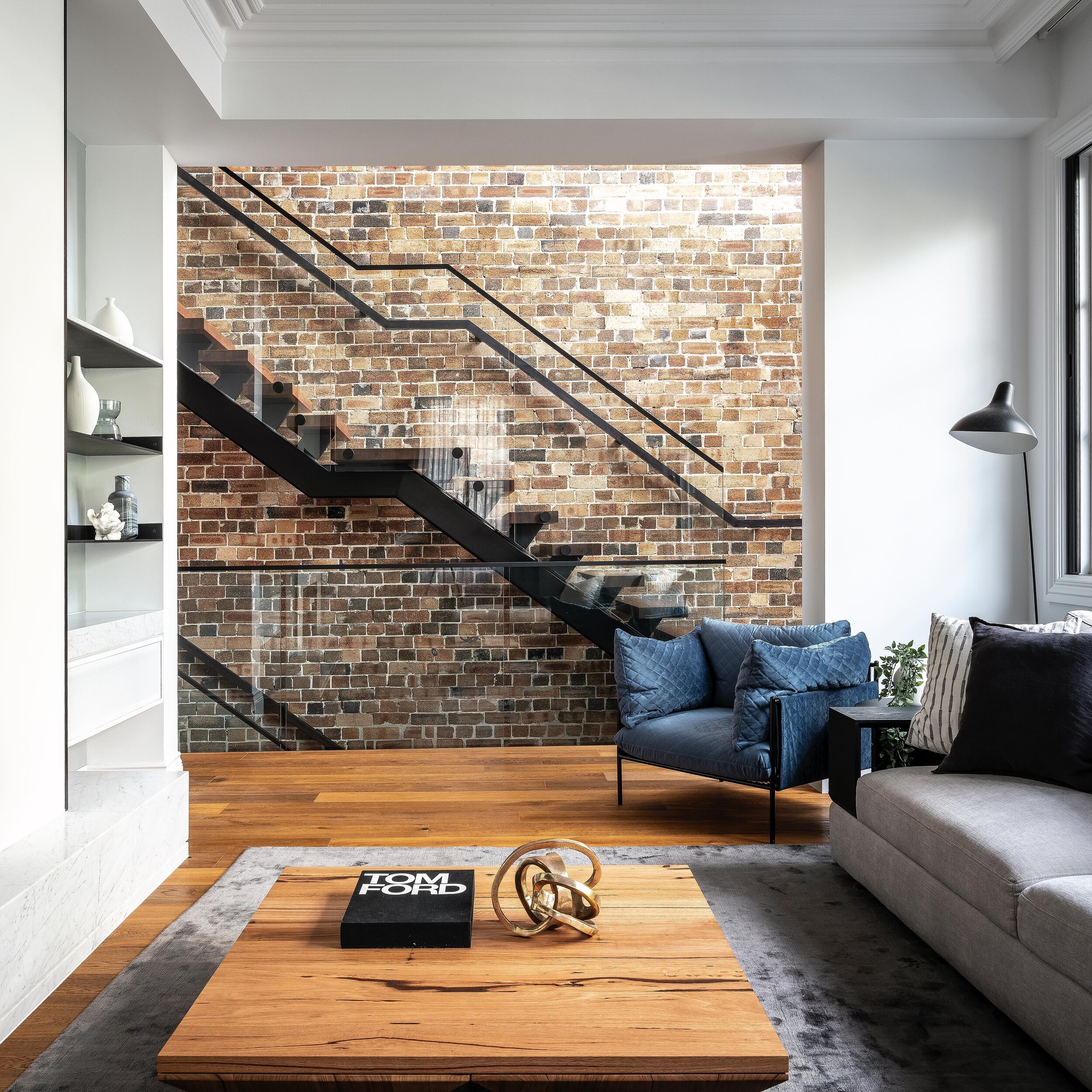 RILEY &bull; We knew this original brickwork had to remain as a feature piece to capture the history of the building. It acts as a warm textural backdrop to the contemporary living space #InnovateInteriors