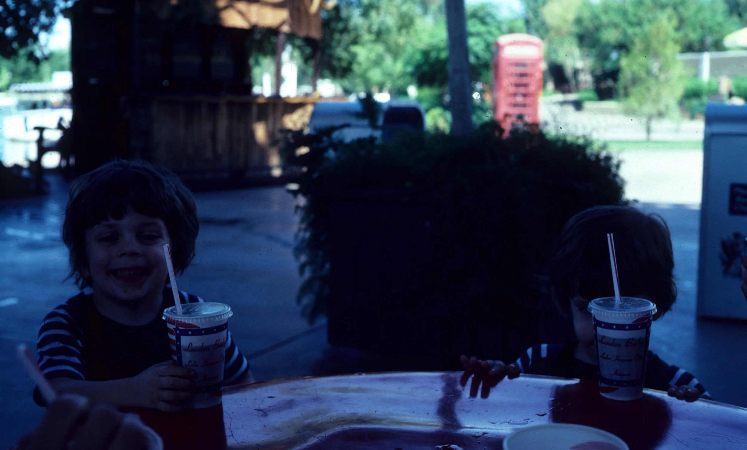 1977 - SUMMER TRIP - OREGON TWINS EATING BURGERS.jpg
