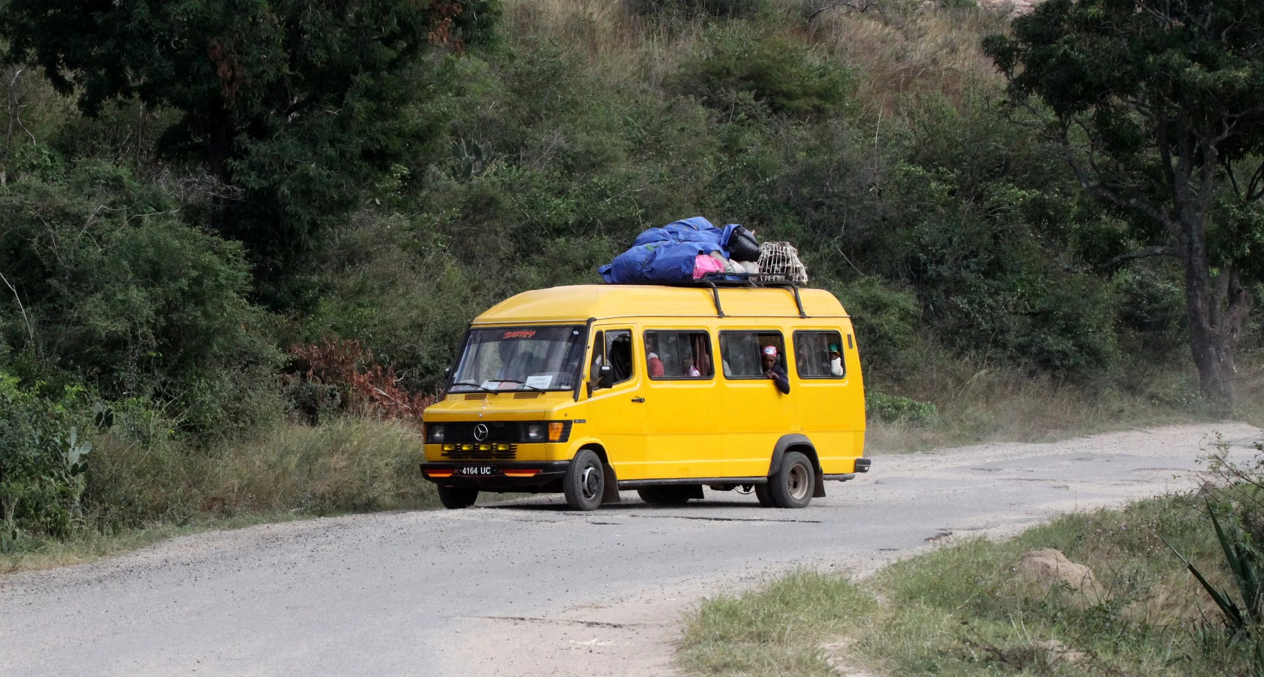 BERENTY MADAGASCAR - BUS ON BAD ROAD.JPG