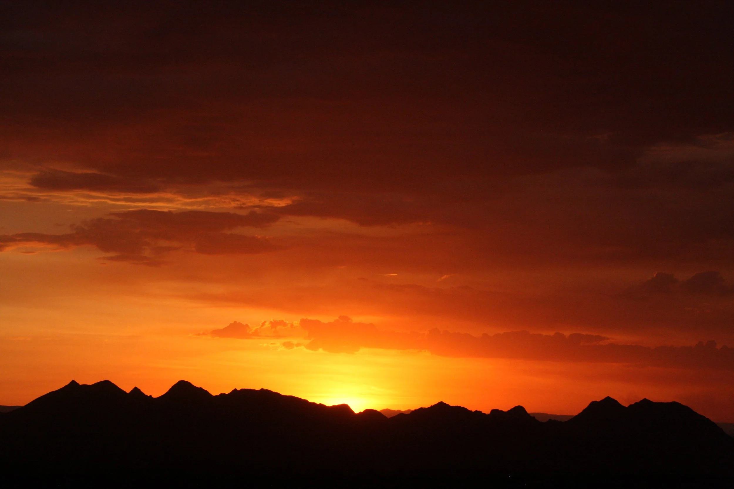 LAS CRUCES NEW MEXICO - SUNSET SEEN FROM ORGAN MOUNTAINS OF WEST MOUNTAINS.JPG