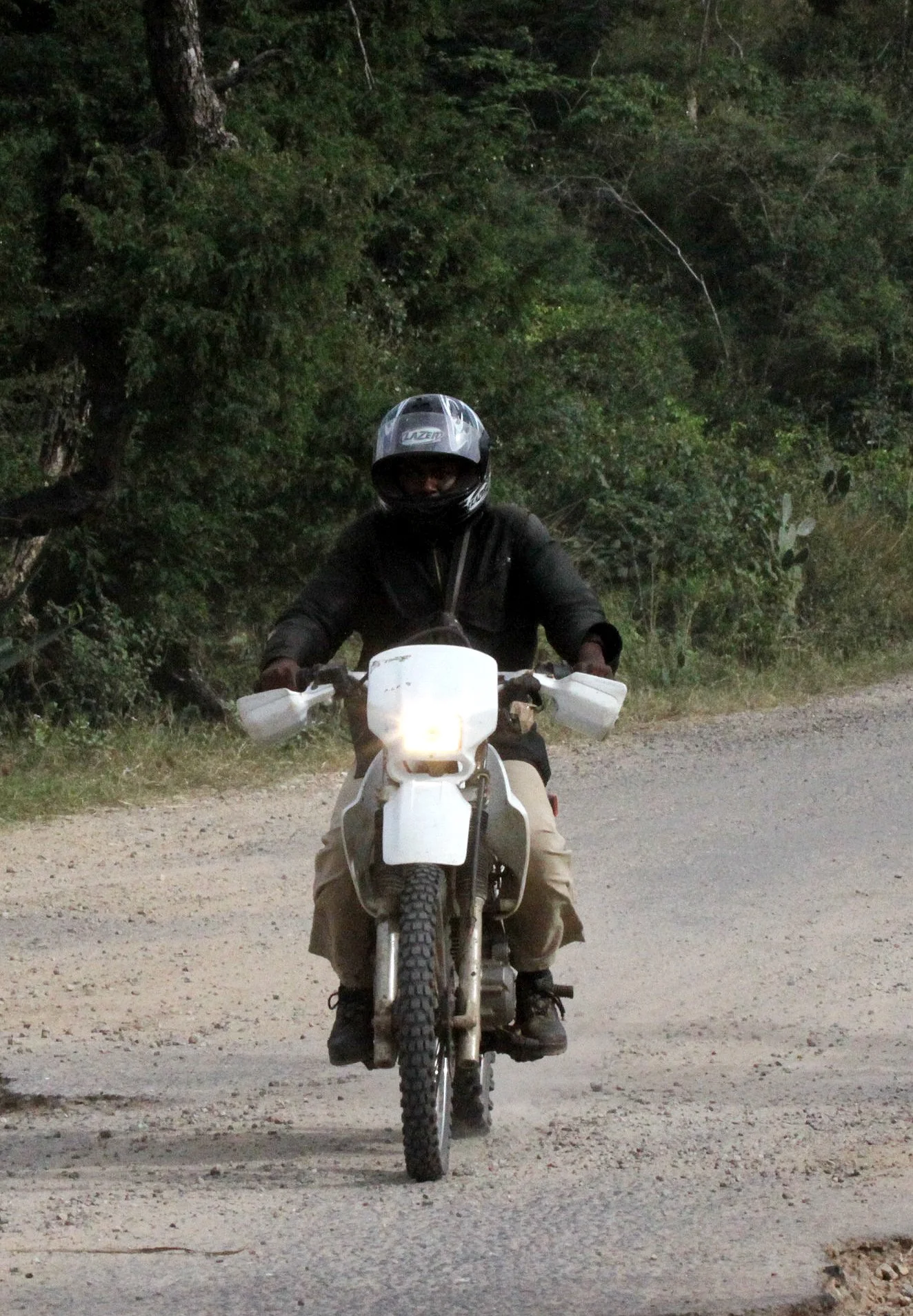 BERENTY MADAGASCAR - MOTORCYCLIST ON ROAD.JPG