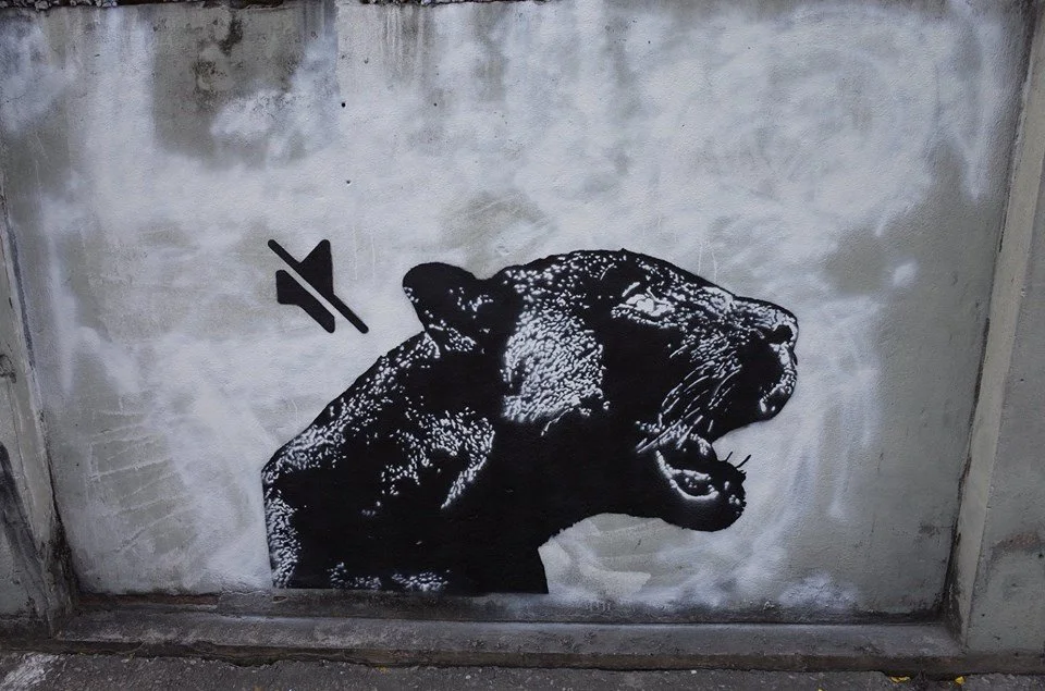 Graffiti symbolizing the case was easy to find throughout Bangkok at that time.  This art mysteriously disappeared.