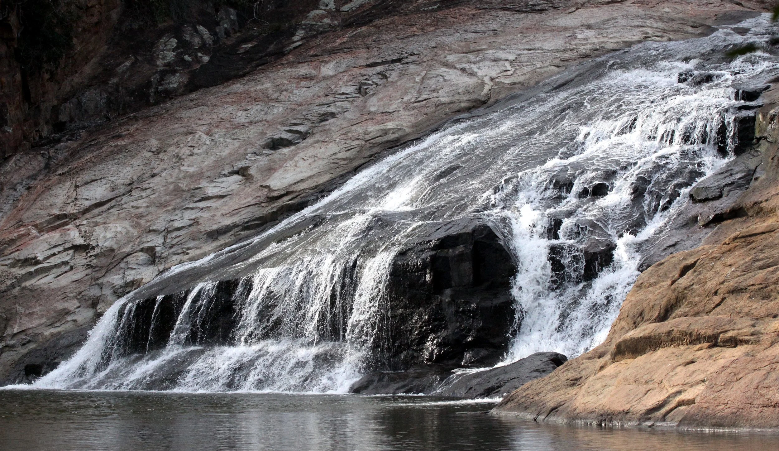 ANDOHAHELA NATIONAL PARK MADAGASCAR - SWMMING AT THE FALLS (4).JPG