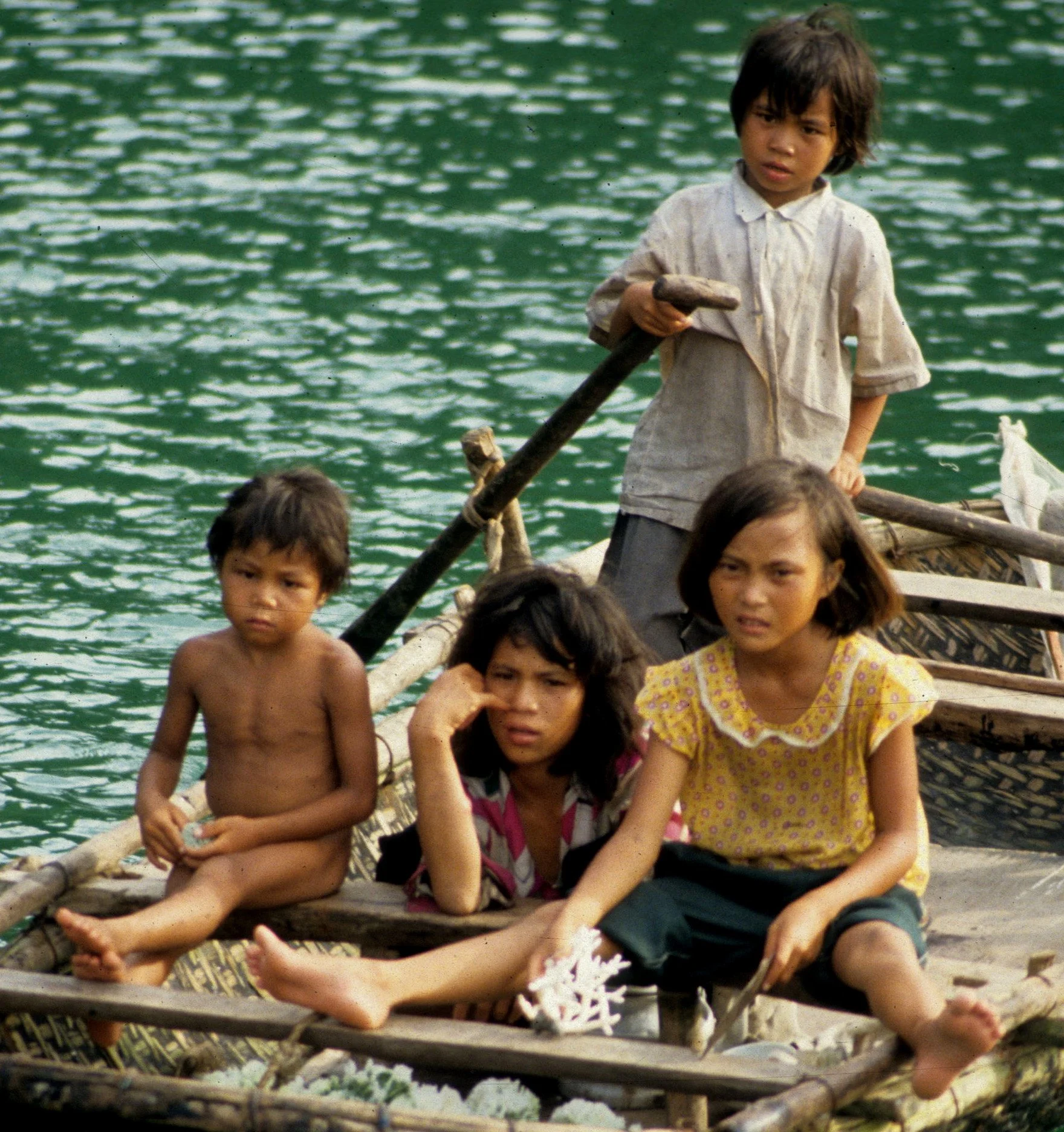 HALONG BAY - CHILDREN SELLING POACHED CORAL A.jpg