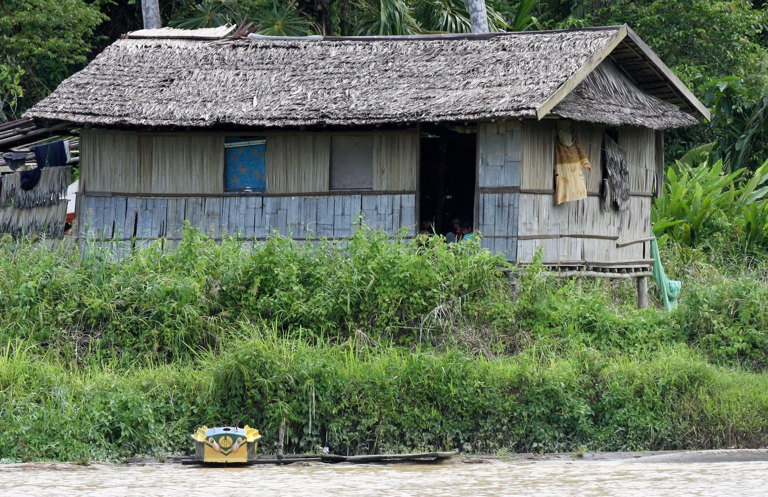 KINABATANGAN RIVER BORNEO - SUKAU VILLAGE.JPG