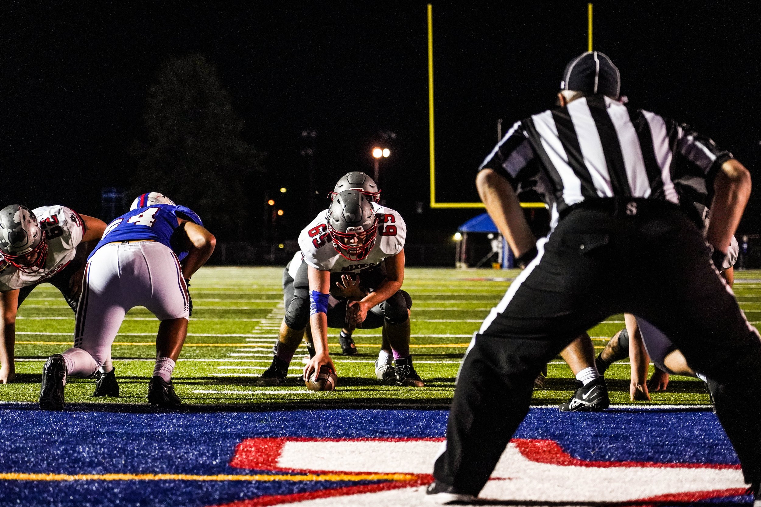 A referee leans in to watch for a touchdown Oct. 14, 2022 at Dr. Larry K. Noel Stadium in Moberly. Mexico secured a touchdown on the next play, but it was not enough to secure the win.