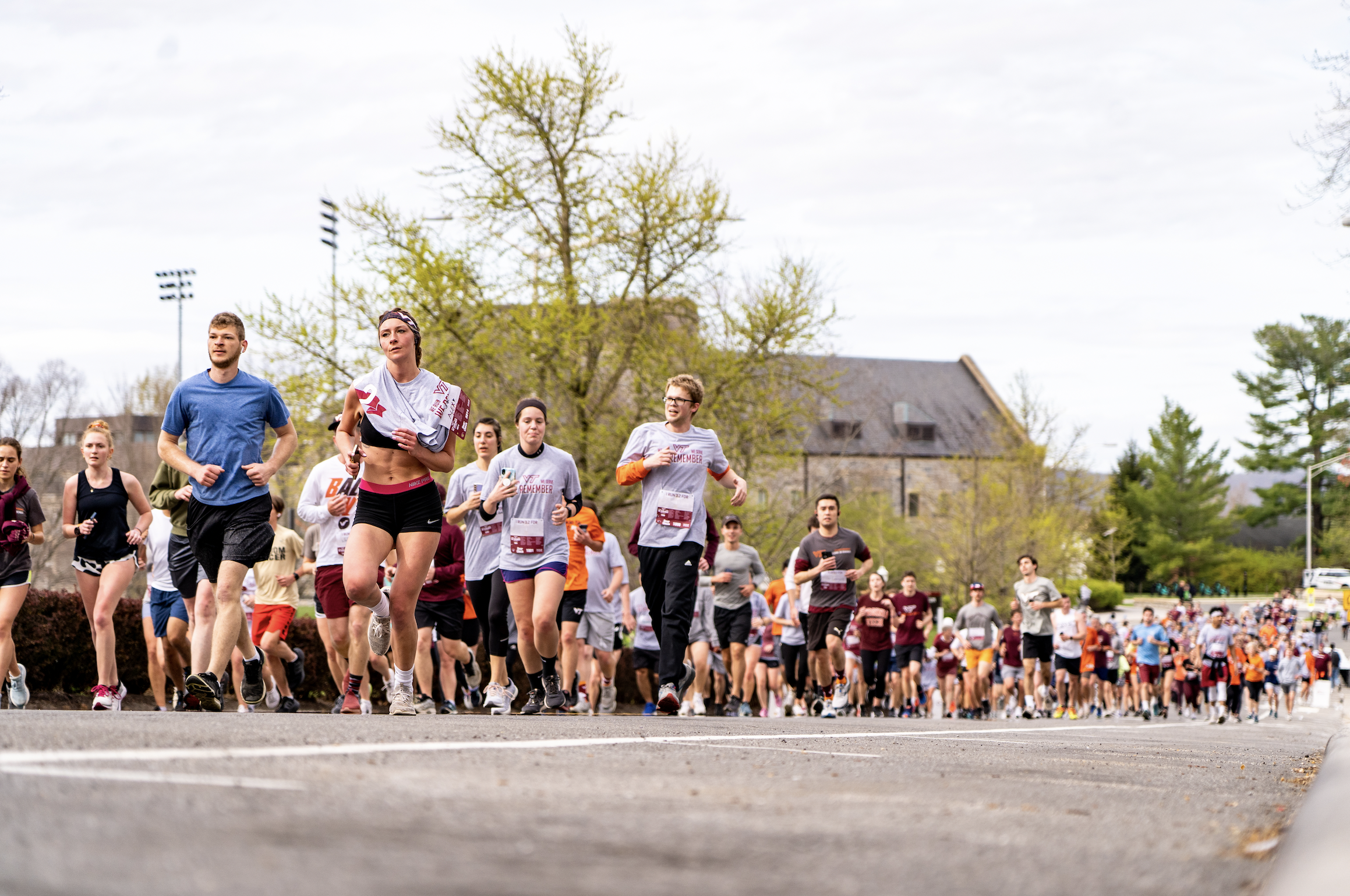 Participants in the Virginia Tech 3.2 for 32 run on Washington Street in remembrance of the 32 lives lost in the 2007 shooting.