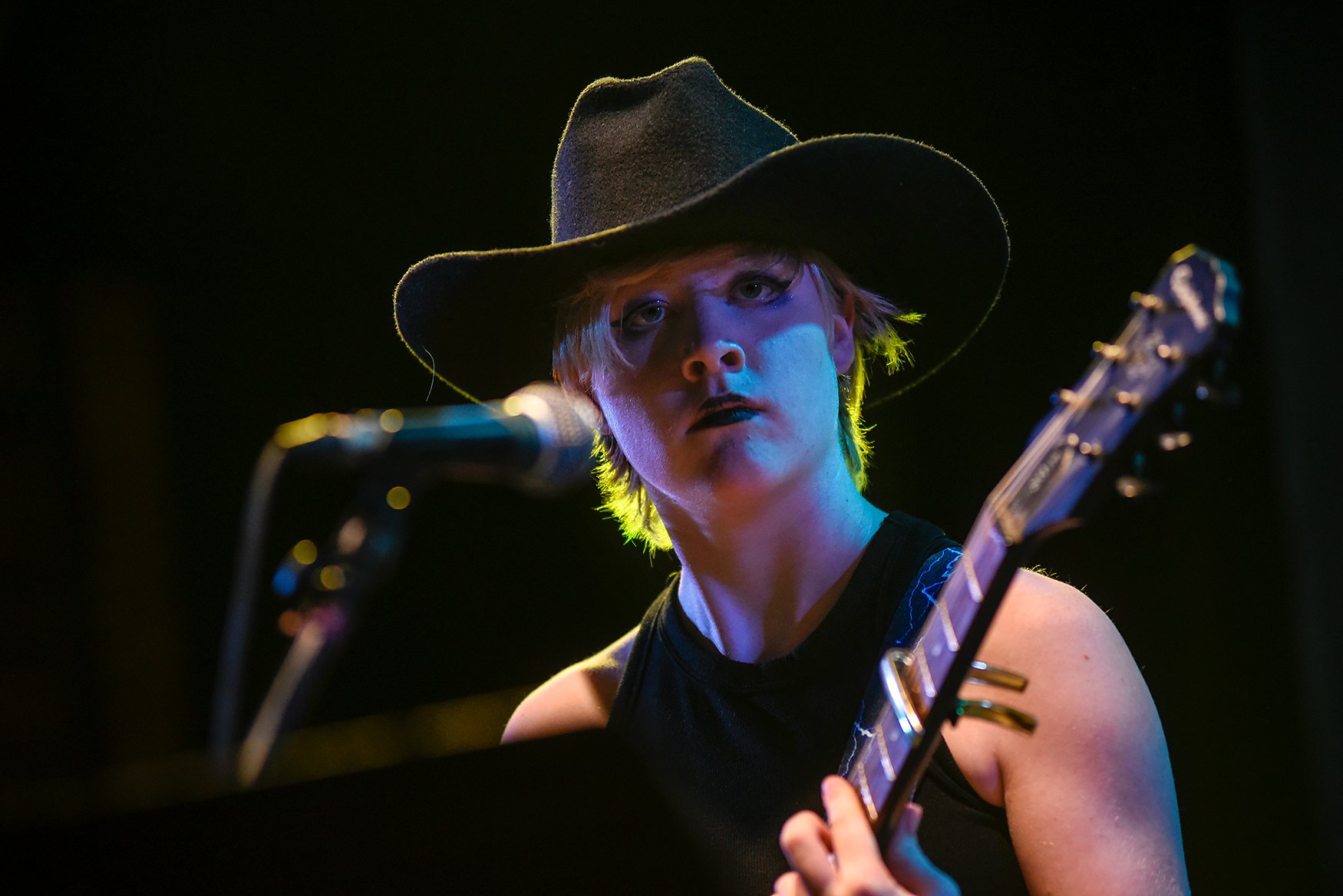 Lyla Brite, 15, plays the guitar with her band, Dusk N Dawn, on July 16 at The Blue Note. Director Violet Vonder Haar emphasized to the crowd that the bands were formed on Monday, wrote their own songs in five days, recorded the songs for SoundCloud