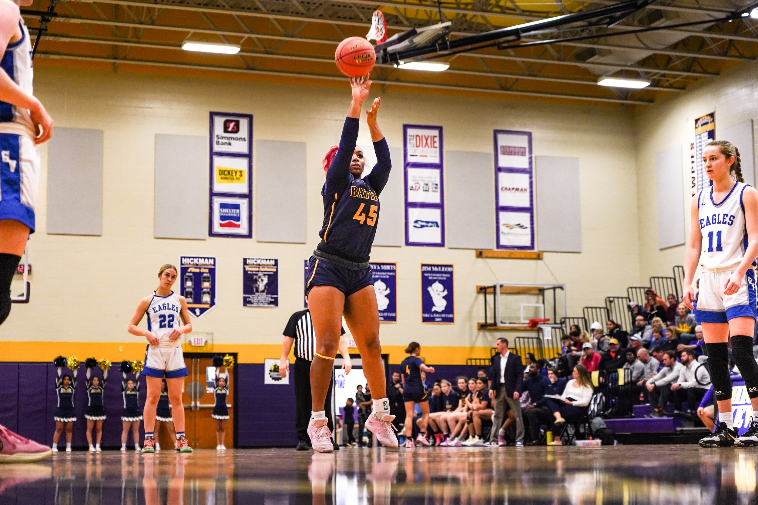 Jaleah Brookins (45), a sophomore forward at Battle, shoots a free throw after a foul under the basket. Brookins was a standout rebounder throughout the game and helped secure several second chance points for the Spartans.