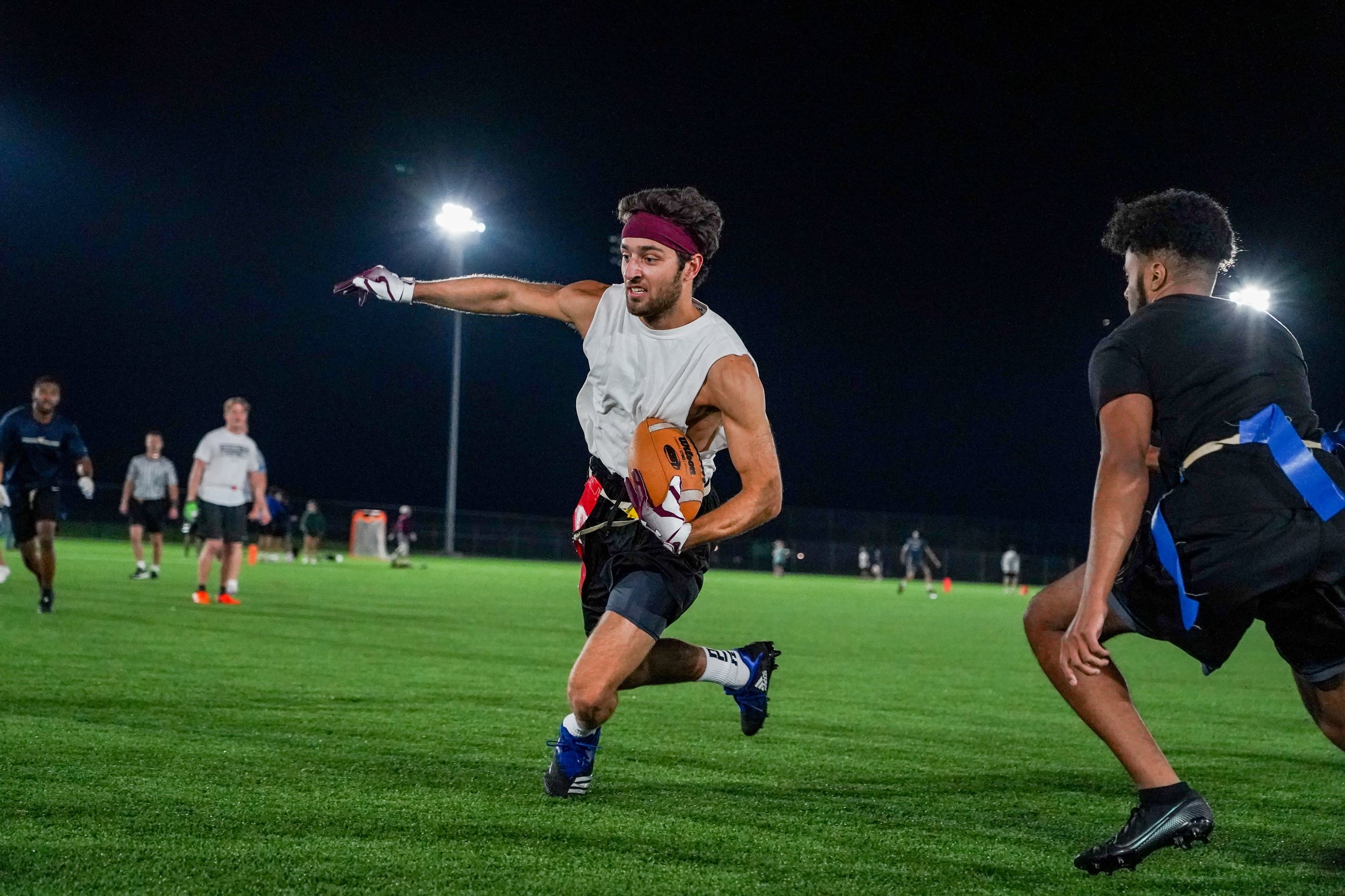 Zach Meiners, 20, rushes against defenders during an intramural flag football game at Virginia Tech. Meiners and his team tried to win the intramural championship for four years and were finally victorious in 2023 during their last season before grad