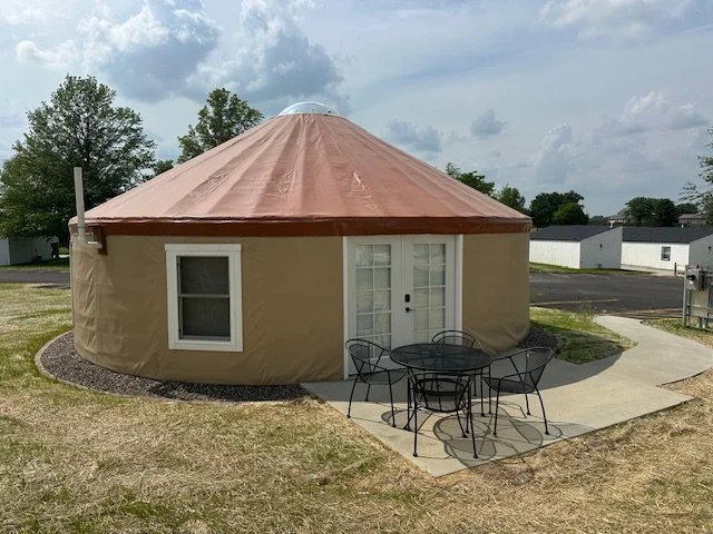 All yurts come with patio seating and propane fireplace. 