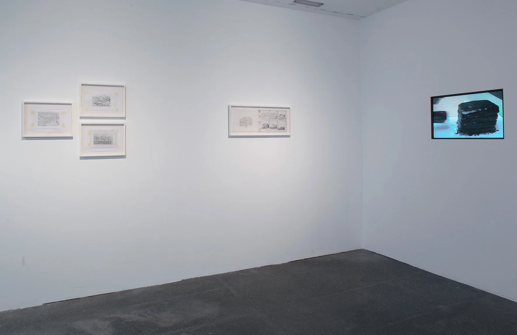  General view of the exhibition, including drawings and a video. © Carlos Bunga. 