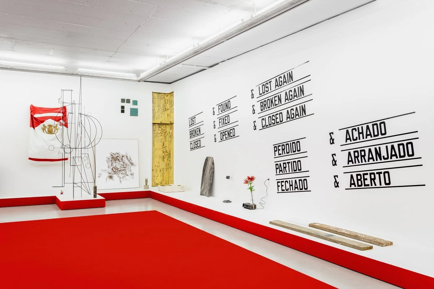  Carlos Bunga’s sculpture can be seen by the right corner, a cardboard and yellow paint wall referring to his architectural spaces and site-specifics. Courtesy: Cristina Guerra Contemporary Art.  