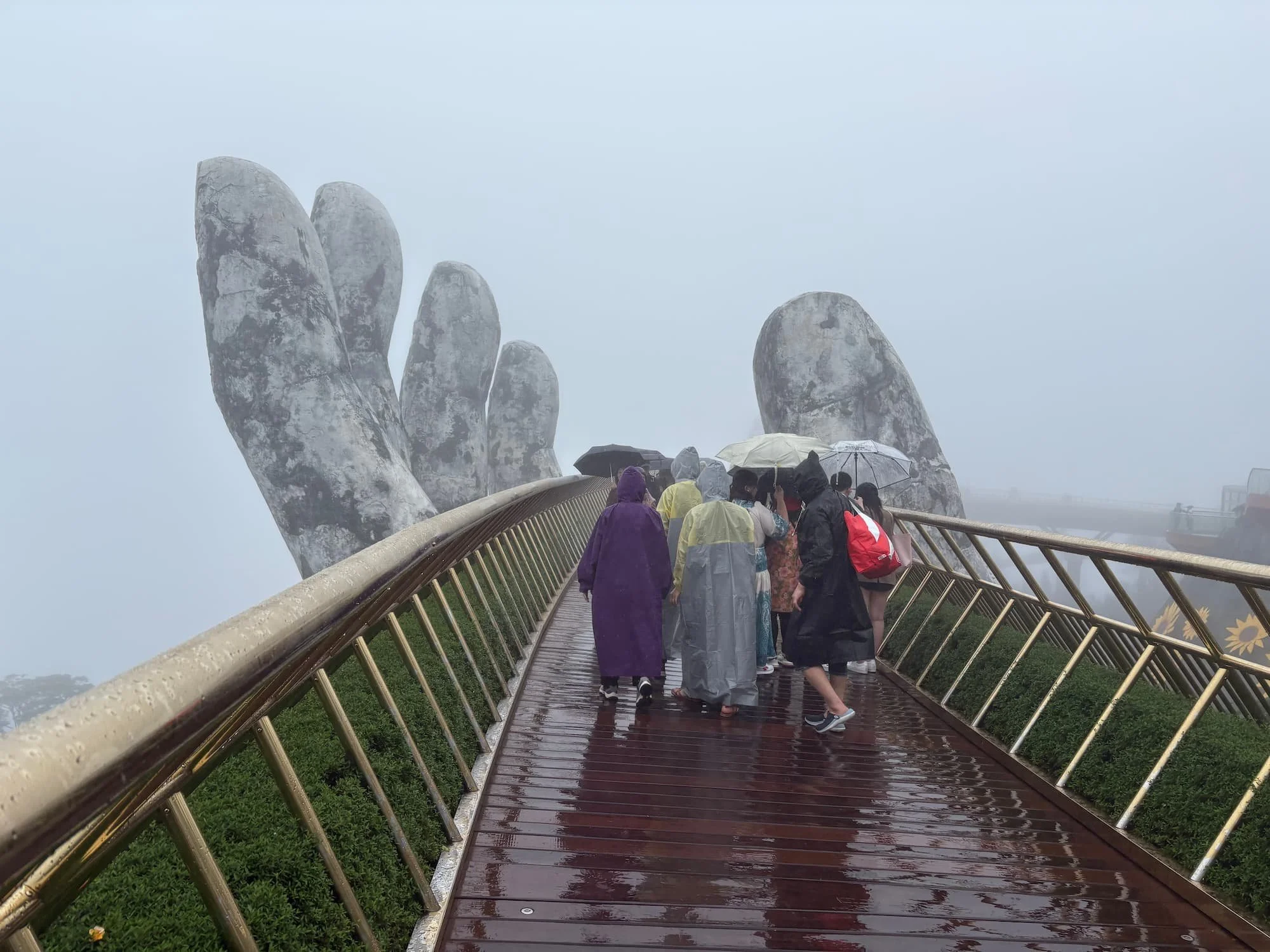 A rainy day at the Golden Bridge in Ba Na Hills.