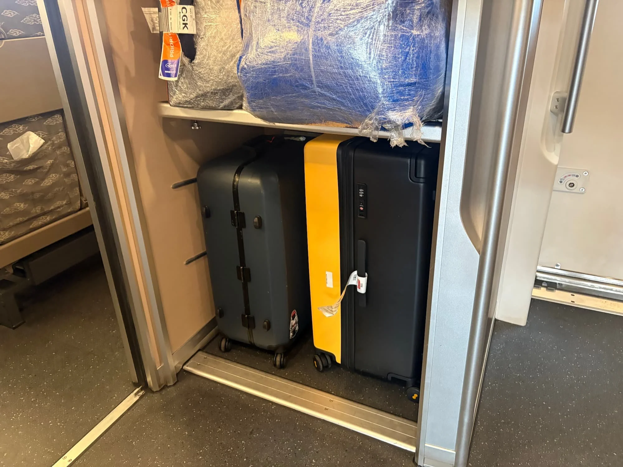 Level 8 Voyaguer suitcase in storage section on Whoosh train in between Jakarta and Bandung in Indonesia