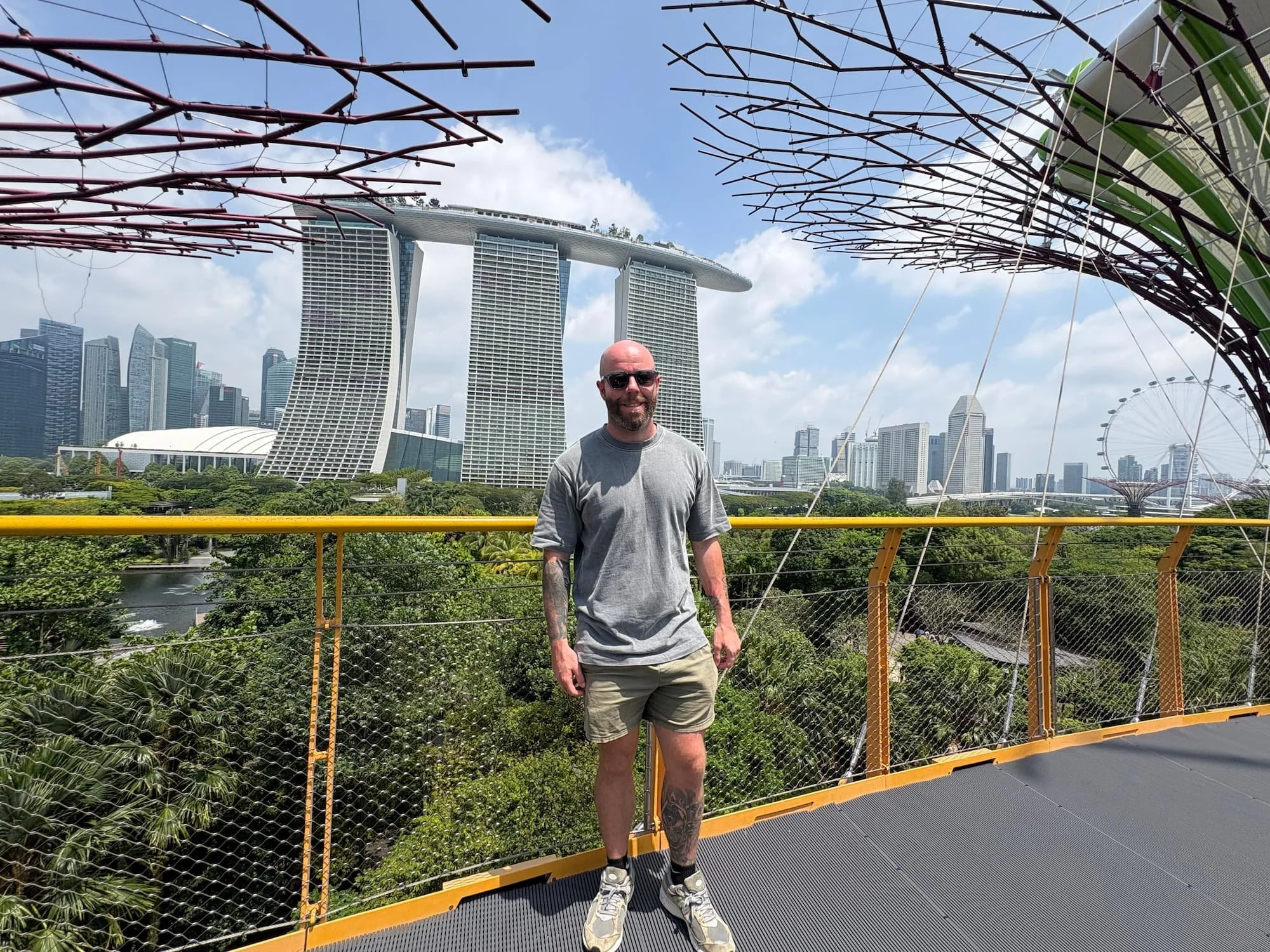 Tom Henty in front of Marina Bay Sands in Gardens by the Bay in Singapore