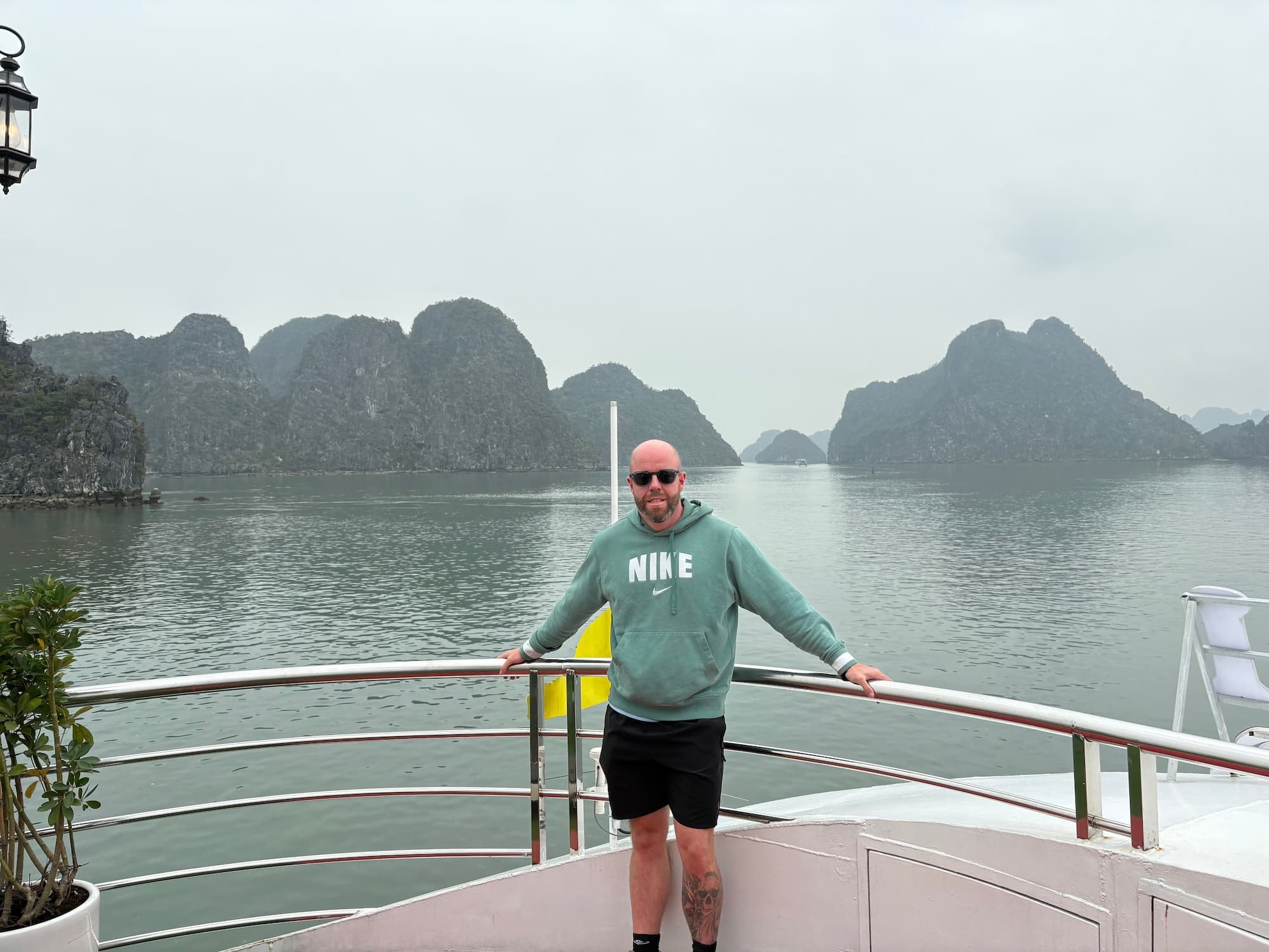 Tom Henty at front of cruise ship on Ha Long Bay Day Tour in Vietnam