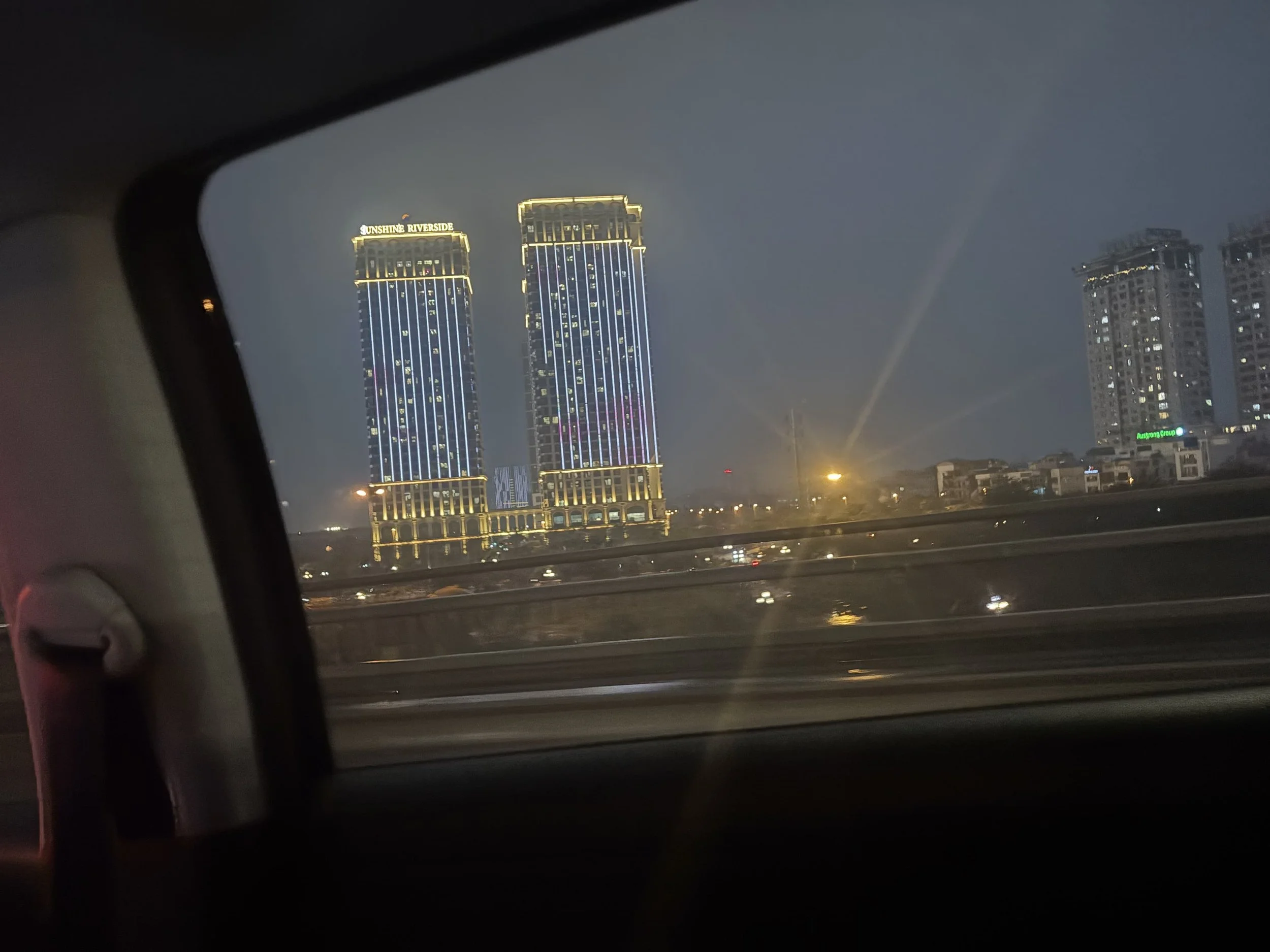 Skyscrapers lit up at night in Hanoi in Vietnam