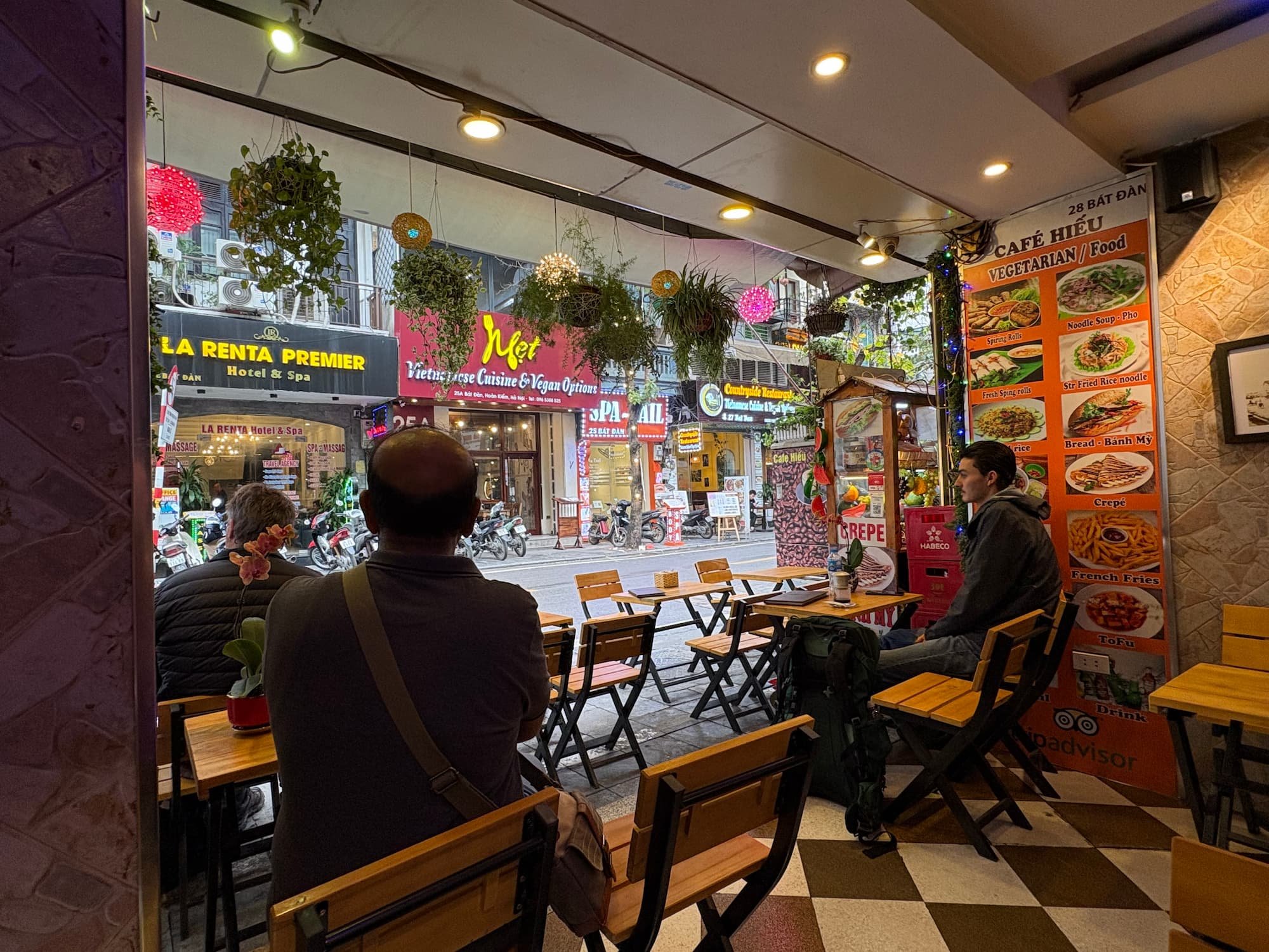Sitting inside a cafe in the Old Quarter of Hanoi watching the street life.