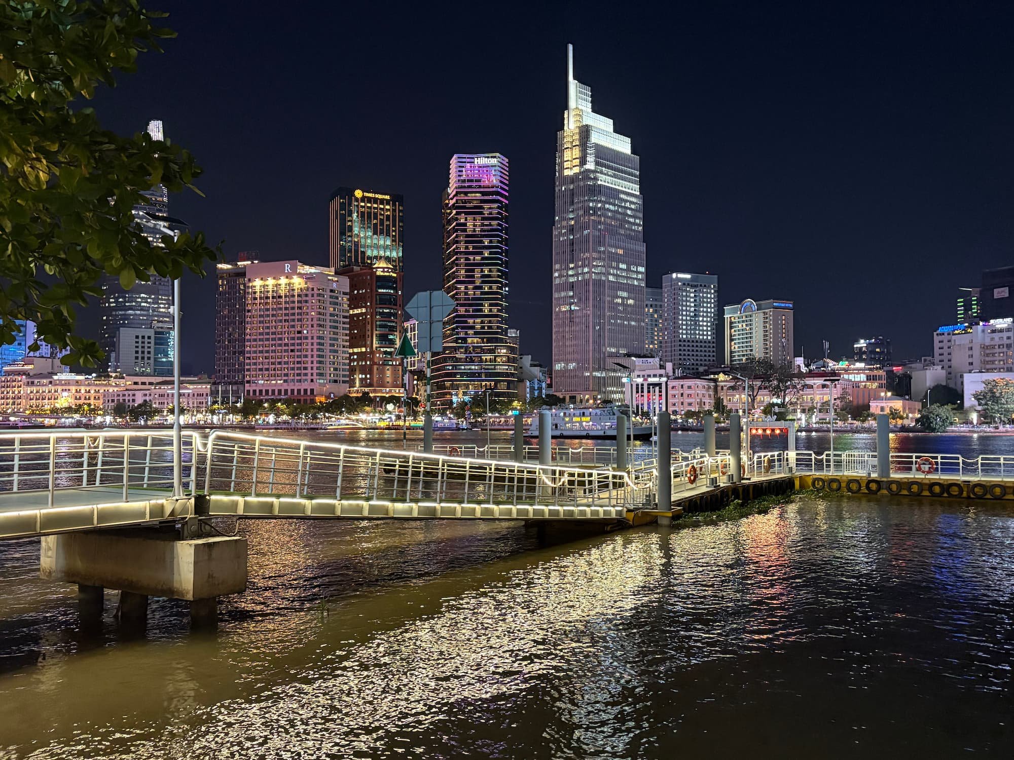 Ho Chi Minh City skyscrapers lit up at night in Vietnam