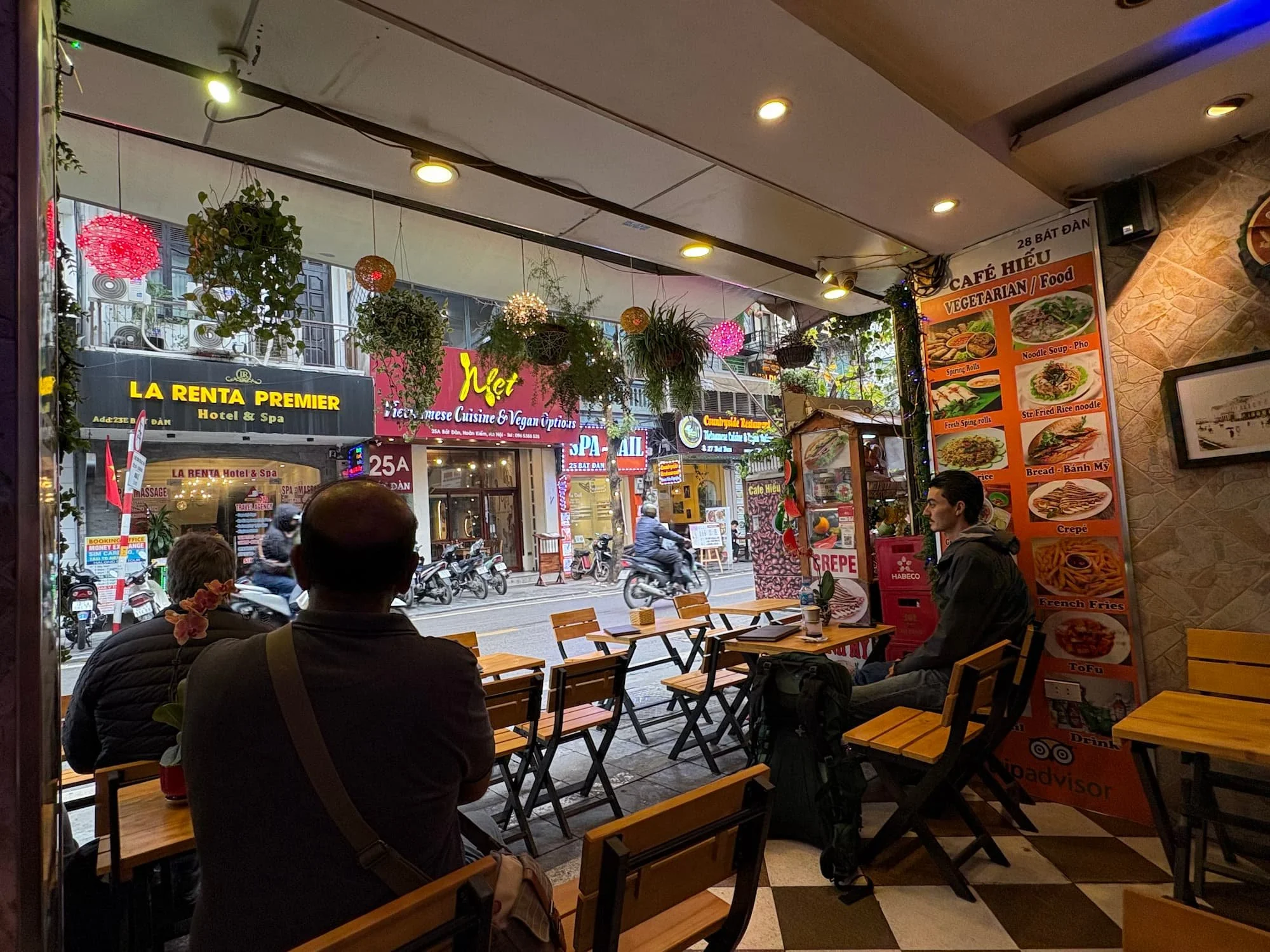 Sitting in a cafe in the Old Quarter people watching