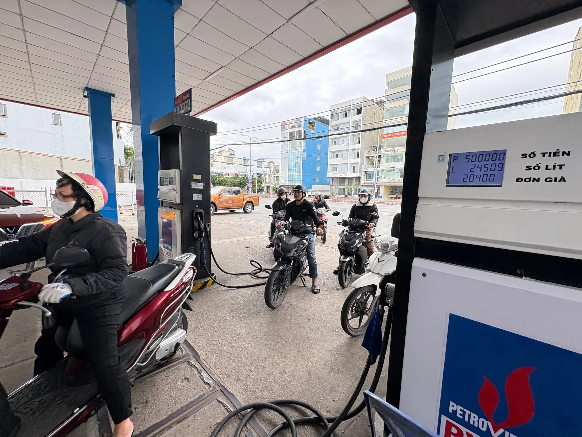 Scooters queuing for fuel in Da Nang in Vietnam