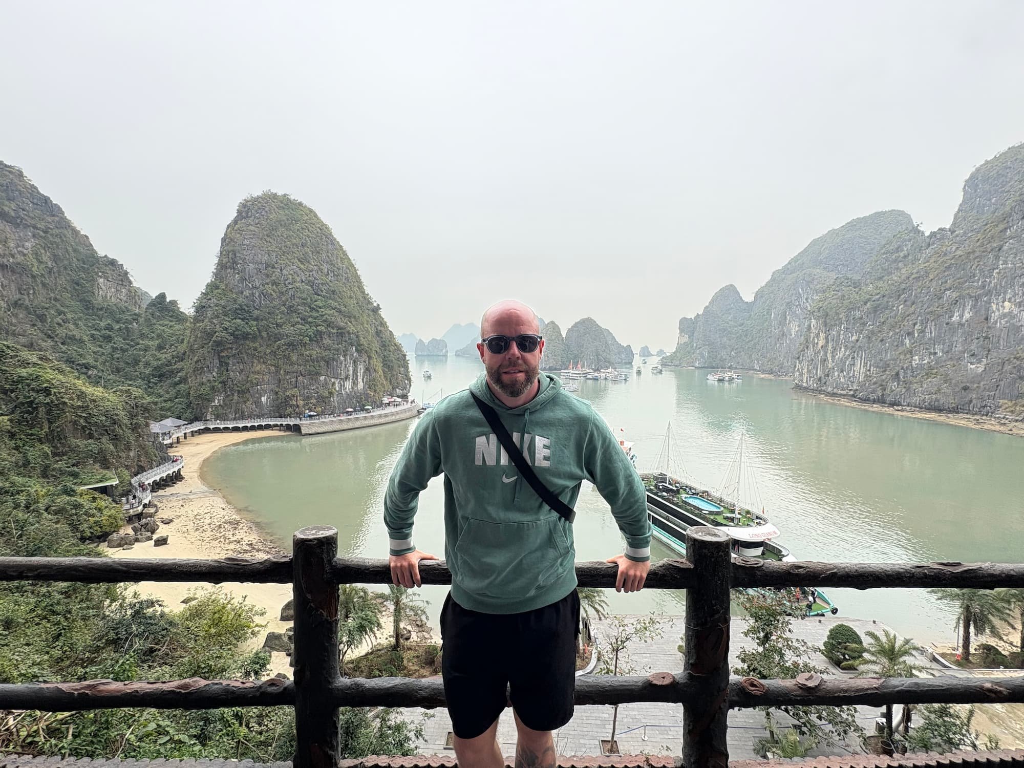 Tom Henty stood at viewpoint at Ha Long Bay in Vietnam
