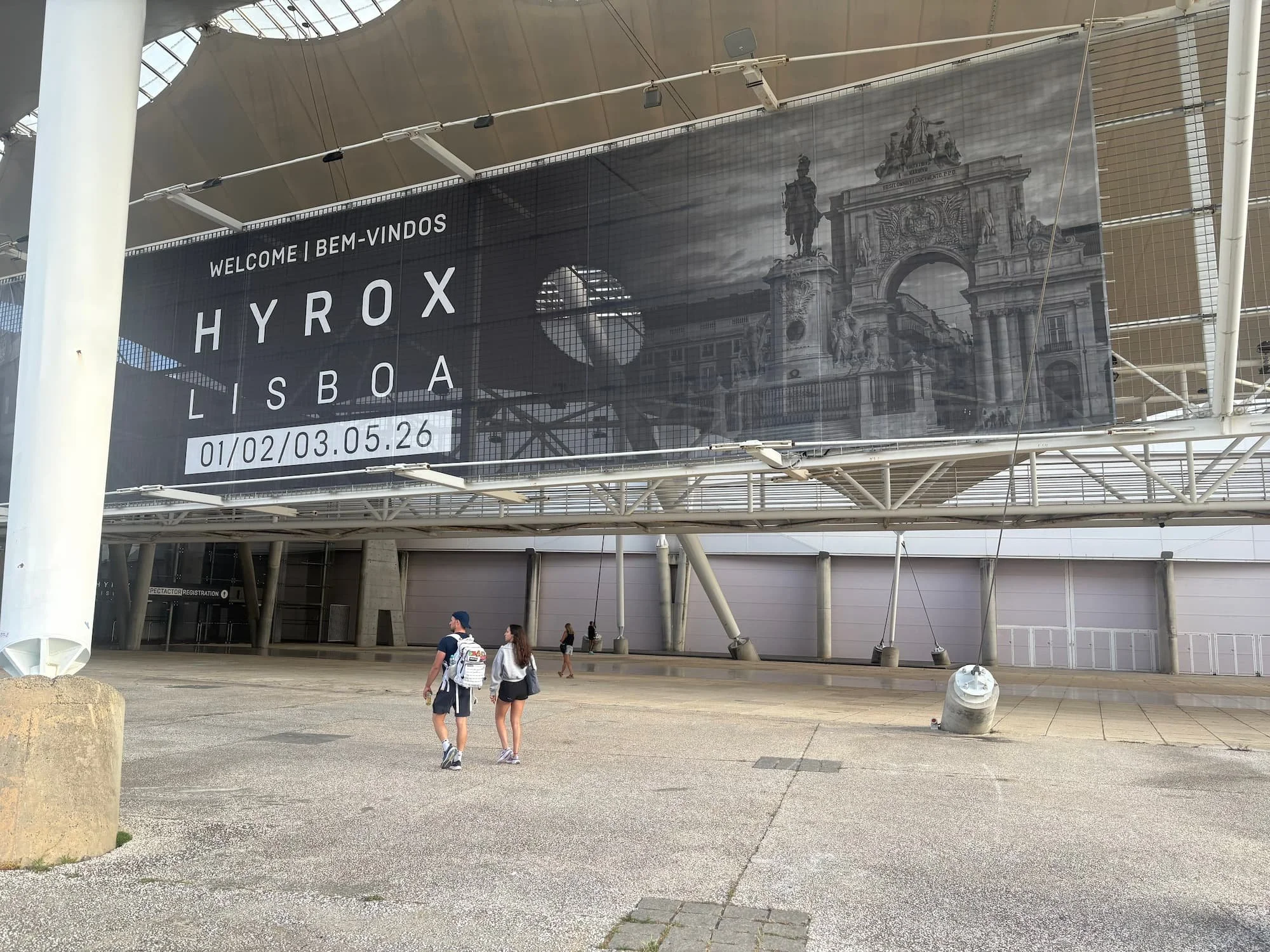 HYROX Lisbon event banner displayed outside Feira Internacional de Lisboa (FIL), the venue for the HYROX competition in Portugal.