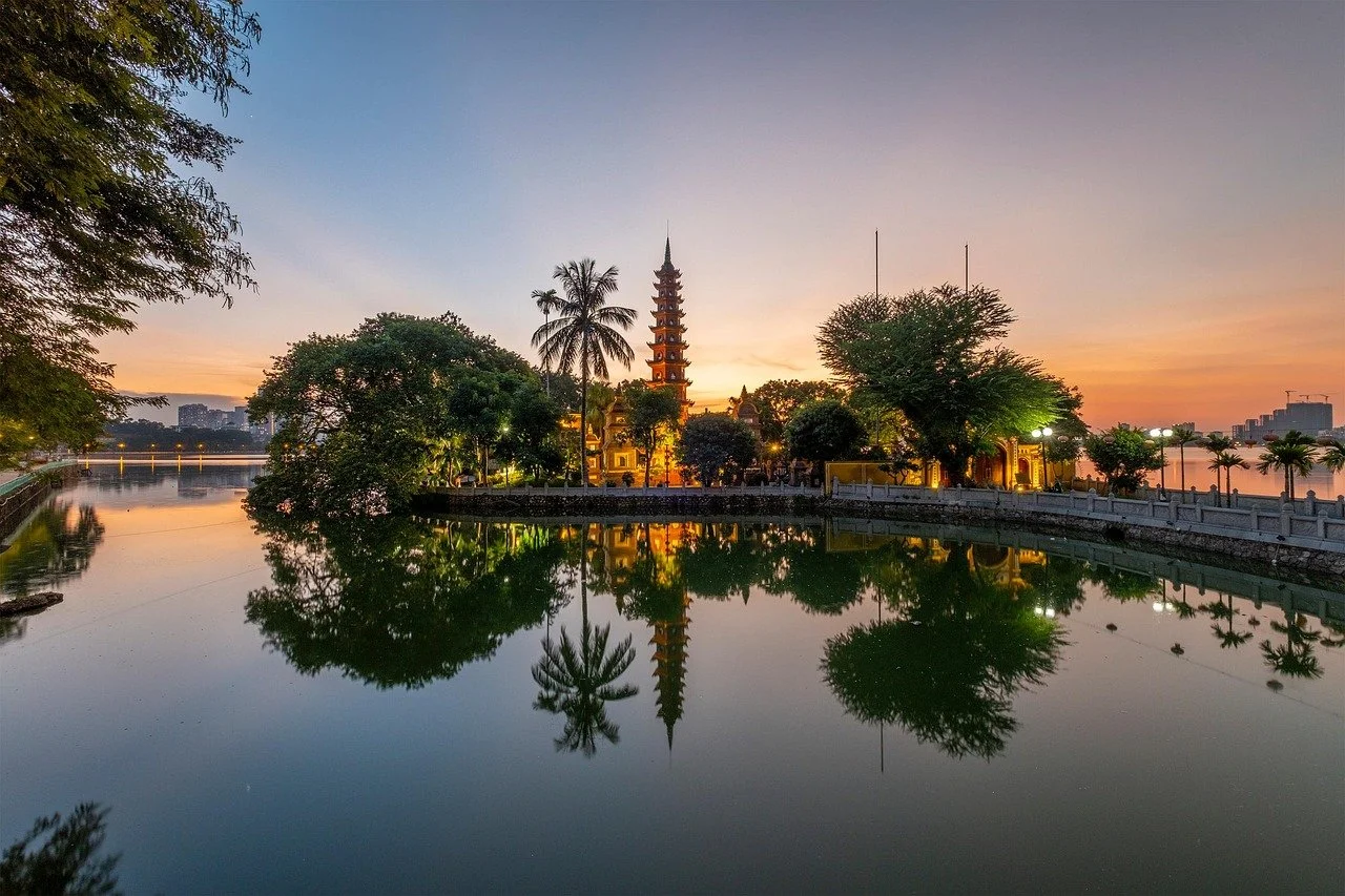 A golden sunset over Tran Quoc Pagoda in Hanoi in Vietnam