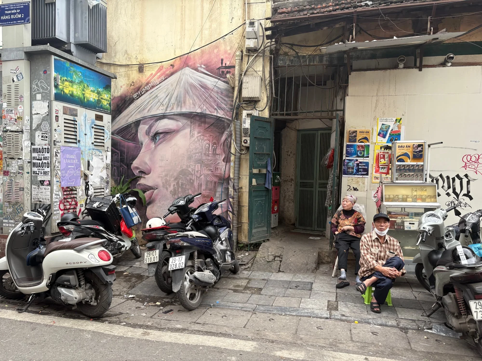 Local vendors and street art in Hanoi in VIetnam