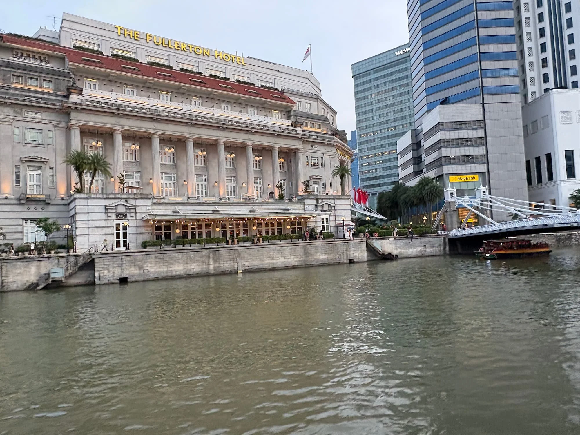 The Fullerton Hotel next to canal in Singapore