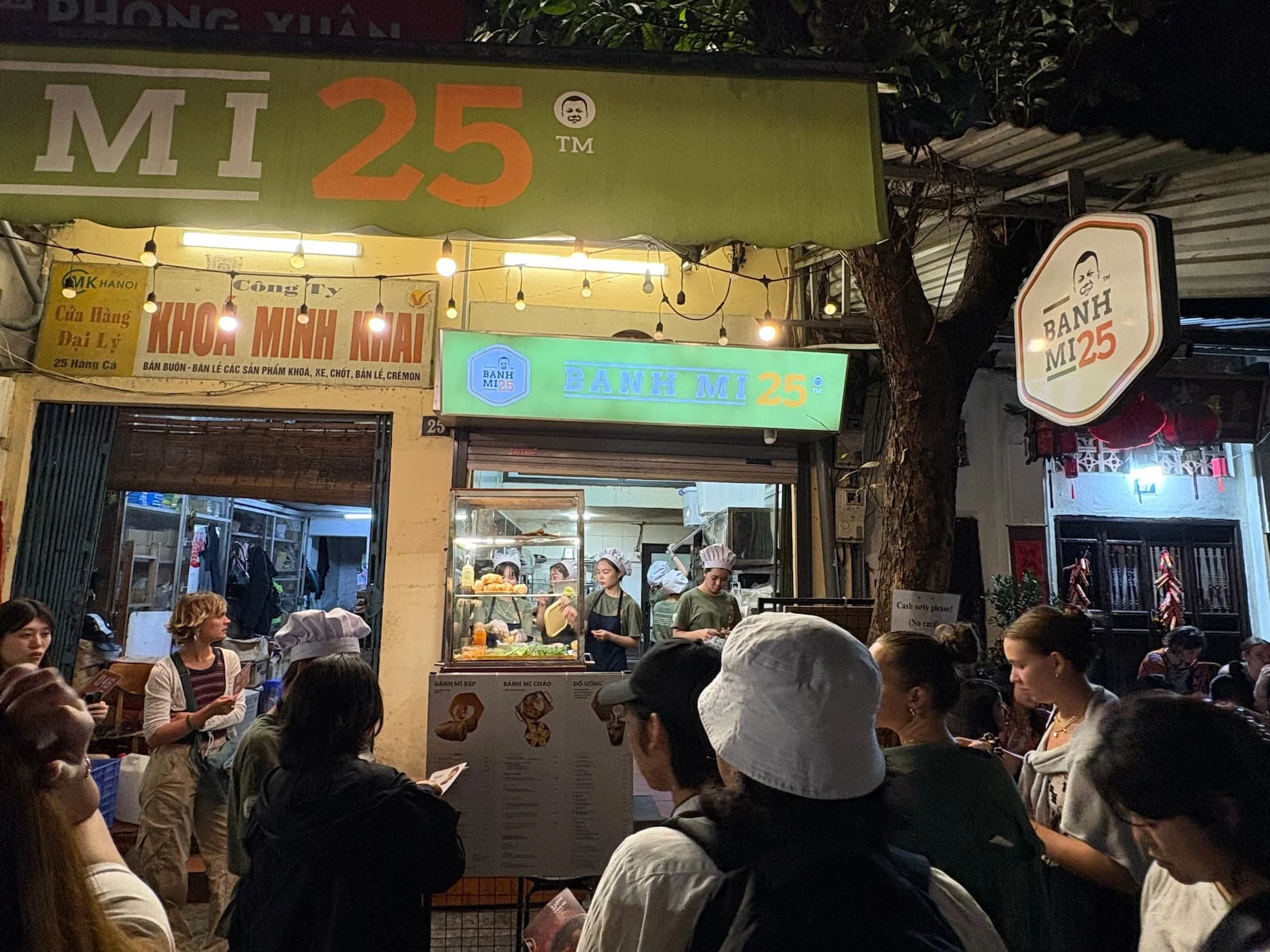A queue t Banh Mi 25 in Hanoi in VIetnam