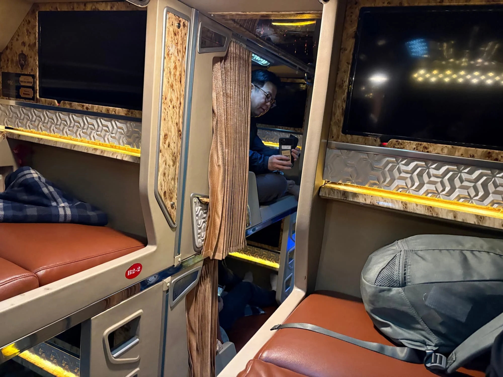 Sitting on bed on luxury sleeper bus in Vietnam between Hanoi and Da Nang.