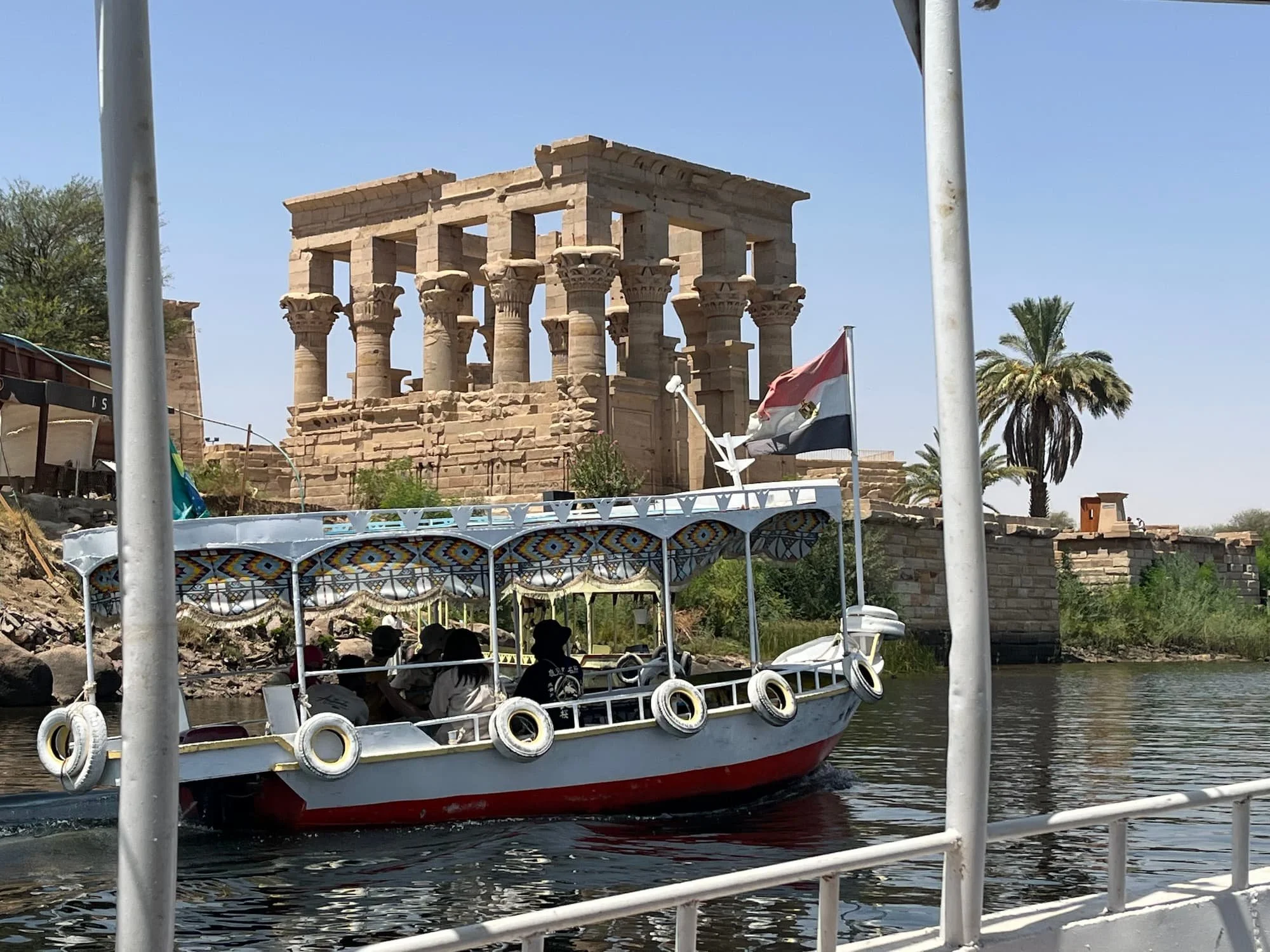 Views of Philae Temple from a boat on the river Nile in Aswan