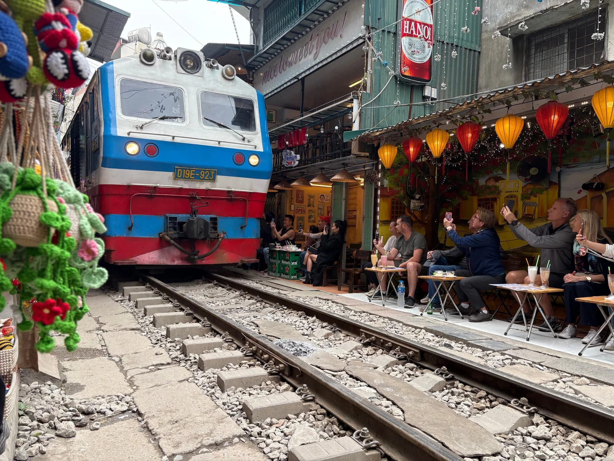Train arriving at Train Street in Vietnam