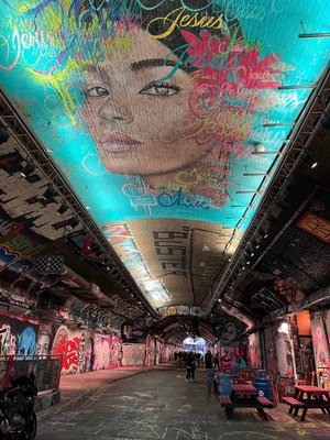 Enjoying street art at the graffiti tunnel at Leake Street Arches in