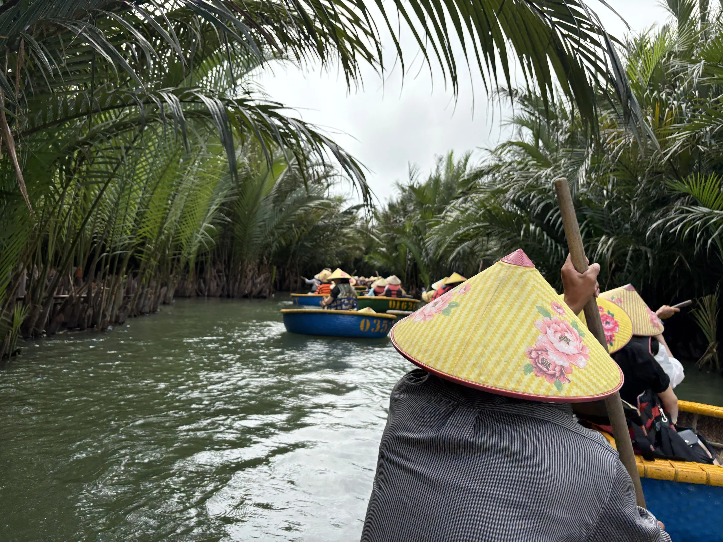 Tom Henty enjoying Hoi An Basket Boat Tour in VIetnam