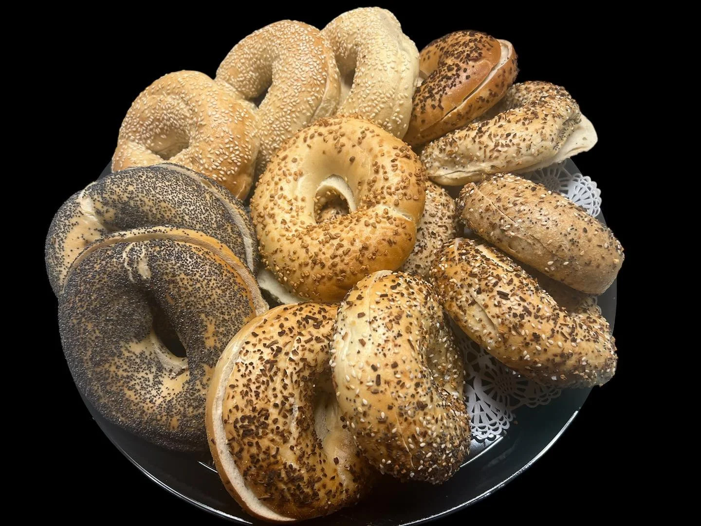 Happy Thanksgiving Eve. We are open until 2 with a full line of our products. 
Award Winning Hot Bagels, World Famous Kweenies, Cinnamon Rolls, Stuffed Croissants and so much more. We will sell out so pre order online or come on down and join the fun