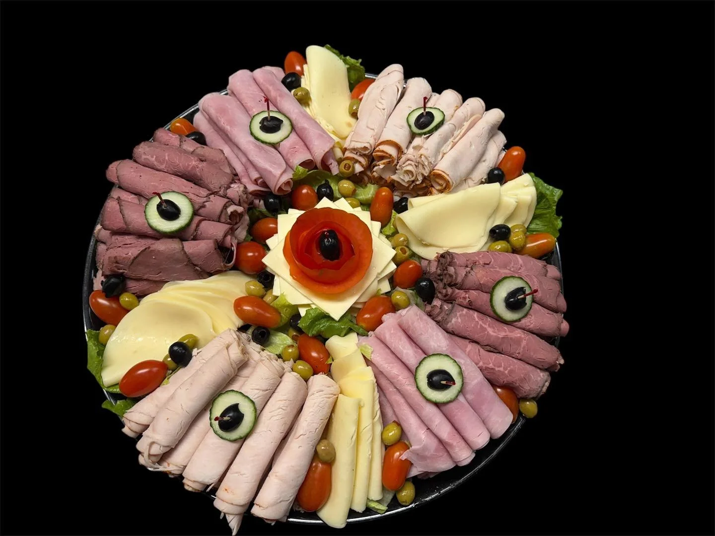 What do I mean when I say that we are not a typical bagel shop ?
This. Sue &amp; staff working hard since 4 AM on beautiful party platters. We take a lot of pride in seeing that each and every catering order that goes out meets our standards. Often t