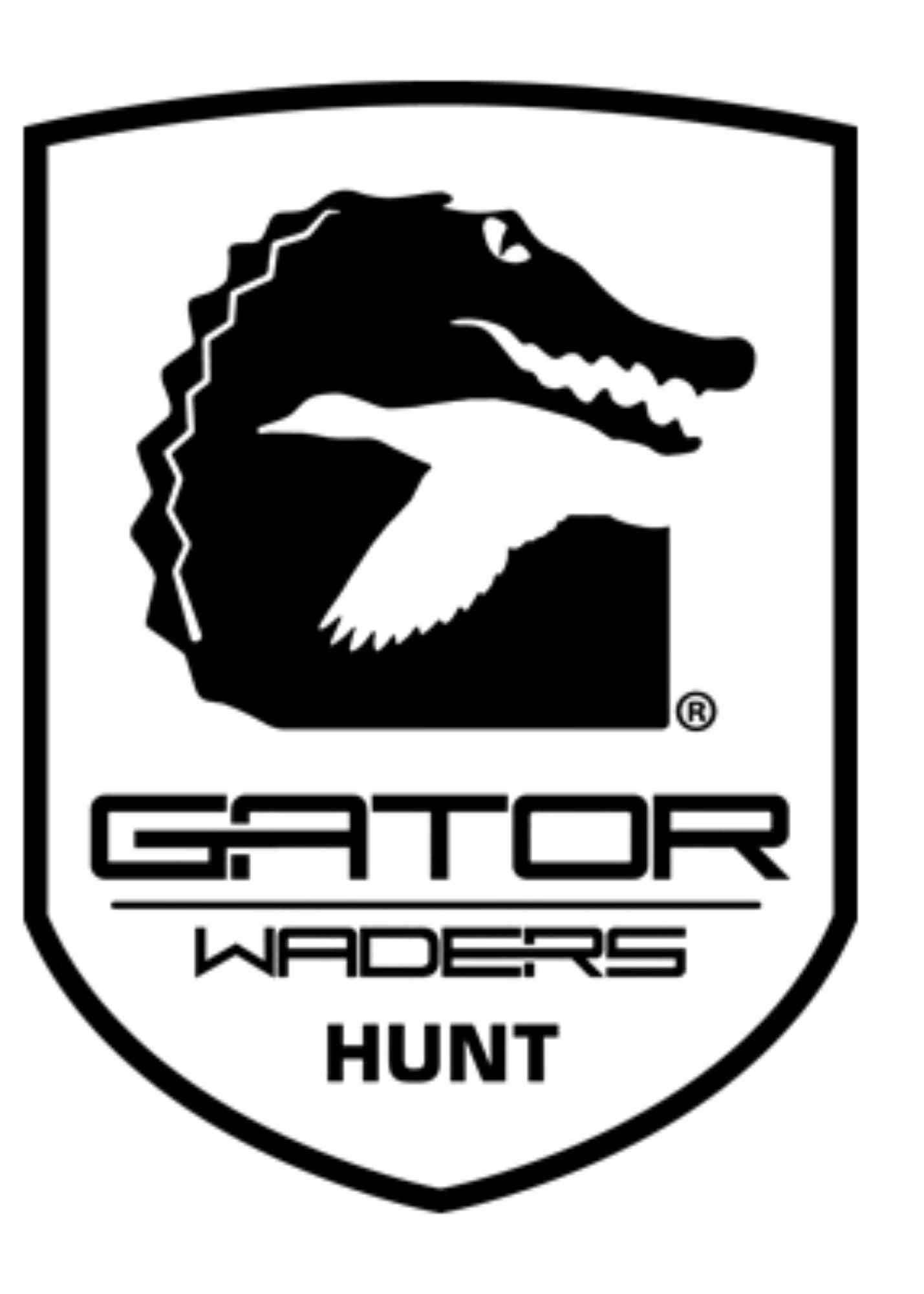 An aircraft flys above a large body of water with many ships and boats, under a cloudy sky.