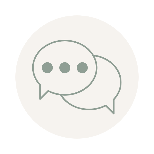 Icon of two overlapping speech bubbles, symbolising conversation or communication.