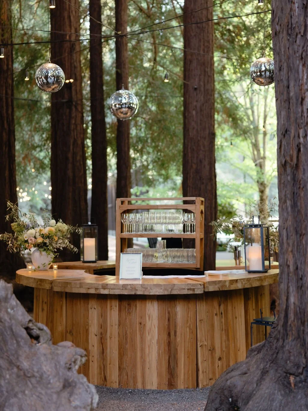 👩&zwj;💻 From the screen to the camera 📸

The idea for a round bar was discussed at our very first walk-through. Circle of redwood trees smack dab in the middle of cocktail hour? 'Twas a no-brainer. The vision evolved only slightly from hanging cha