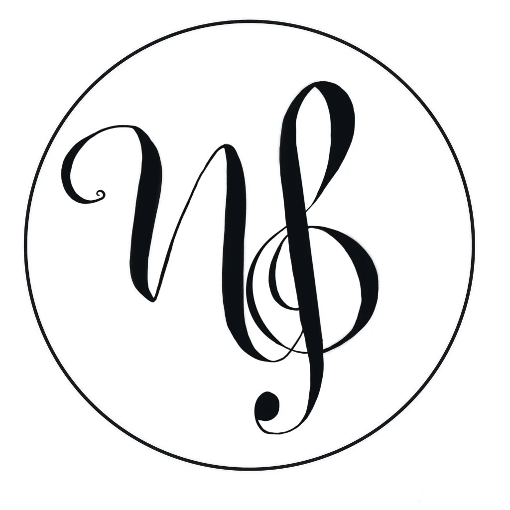 A black monogram with stylized initials inside a circle.