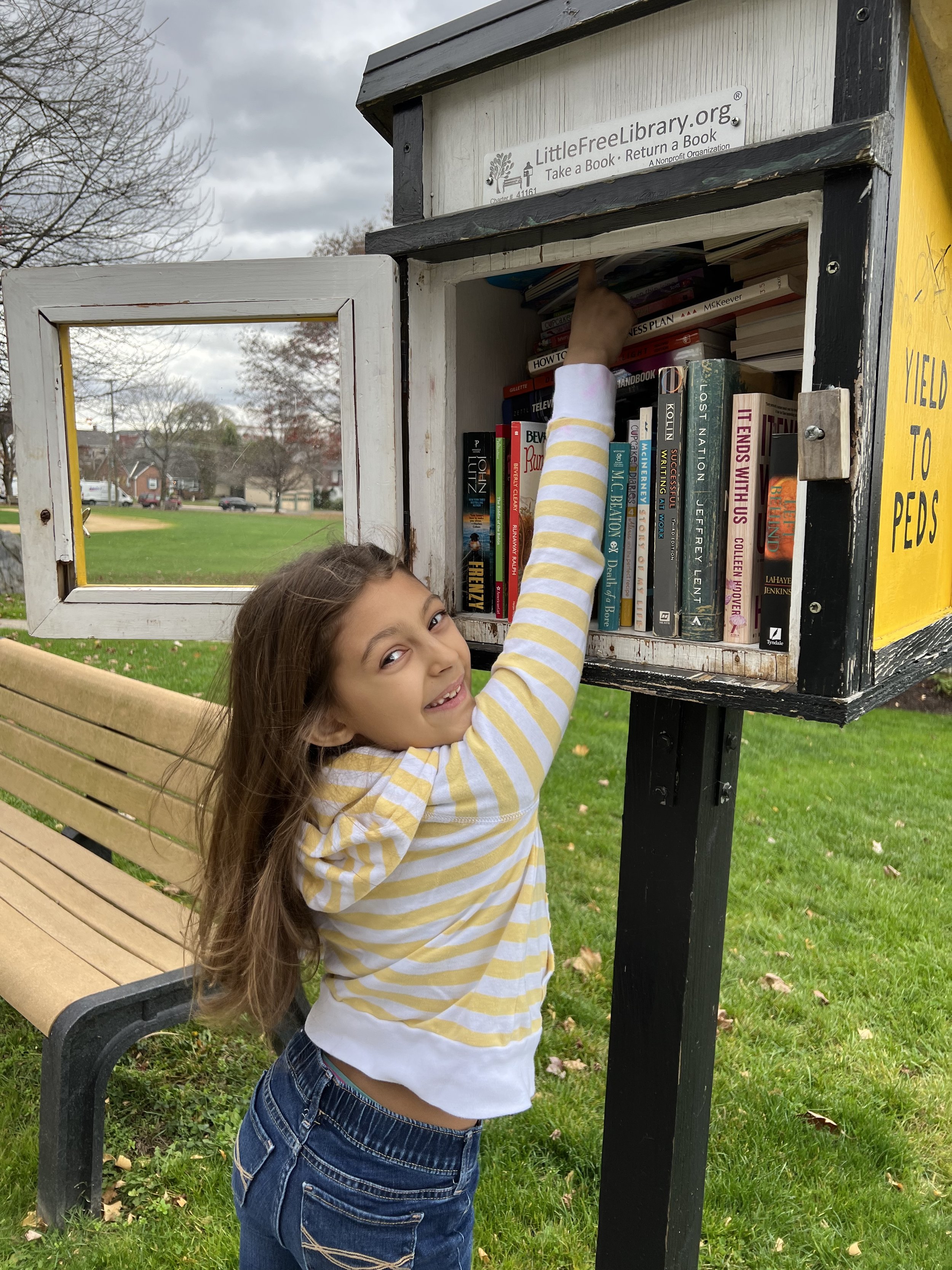 Donating Books to our Little Free Library during World Kindness Week