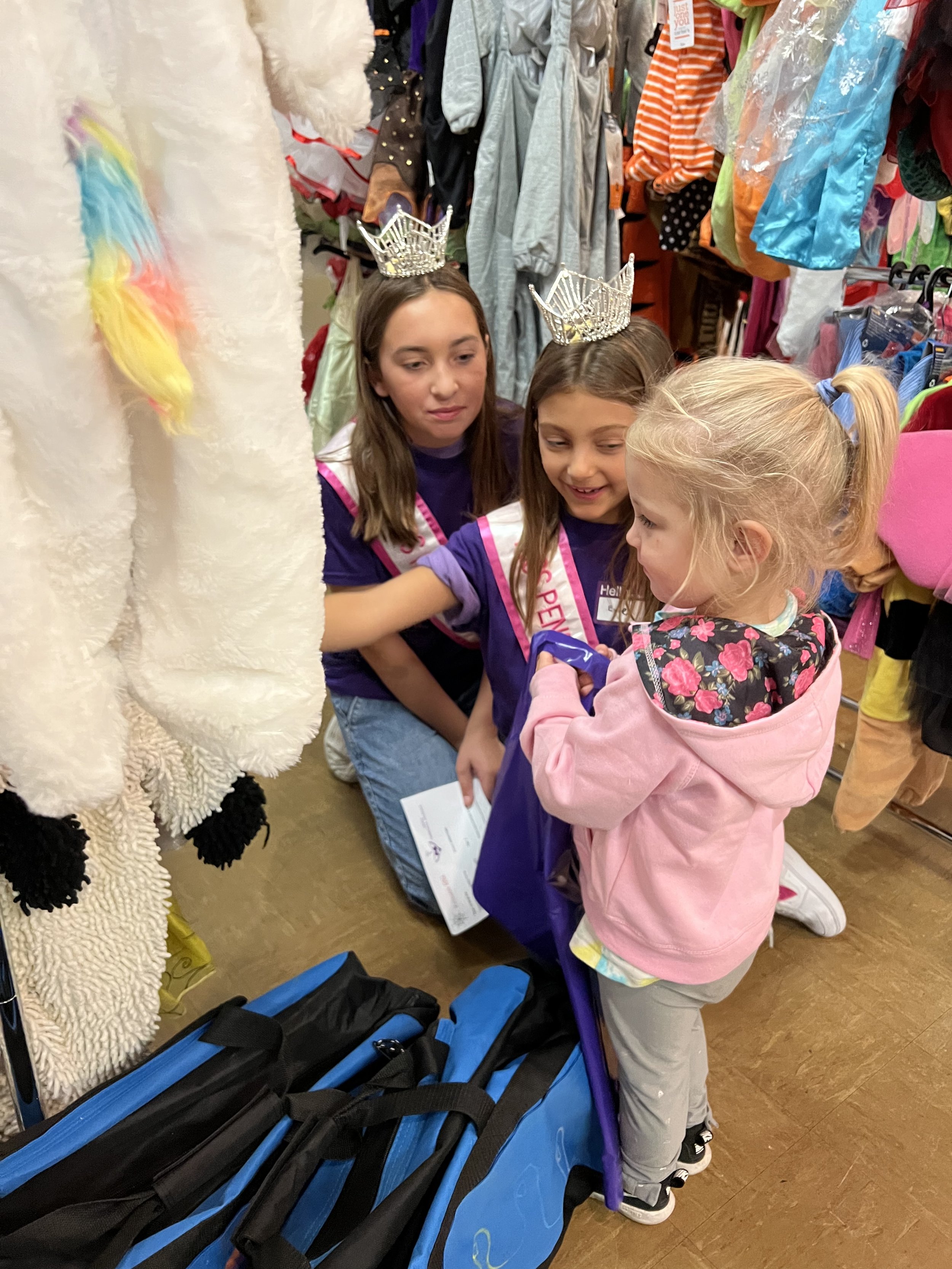 Volunteering at Angel's Community Outreach's Halloween Event. I got to help kids that didn't have a Halloween costume pick one out. I absolutely loved doing this. It made me so happy to know they got a costume.