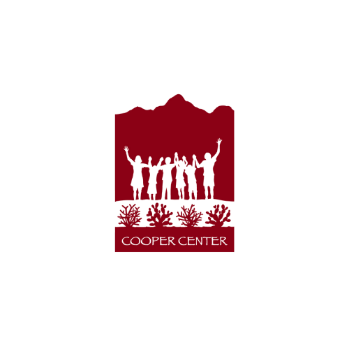 Silhouette of seven people holding hands with arms raised, standing on land with shrubs and the words "Cooper Center" below.