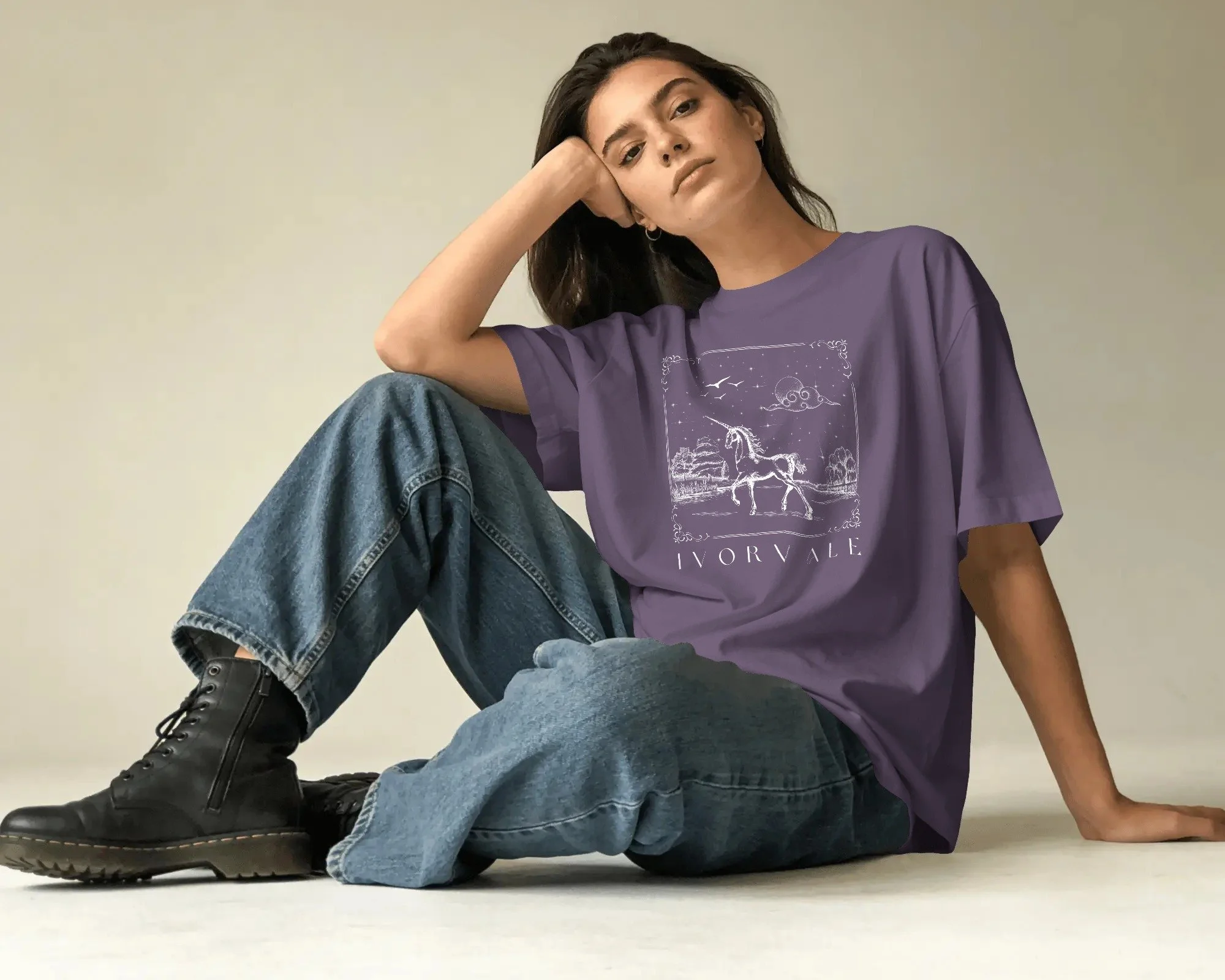 relaxed-lifestyle-t-shirt-mockup-female-model-sitting-floor-hand-on-head-soft-lighting-03919 copy.jpg